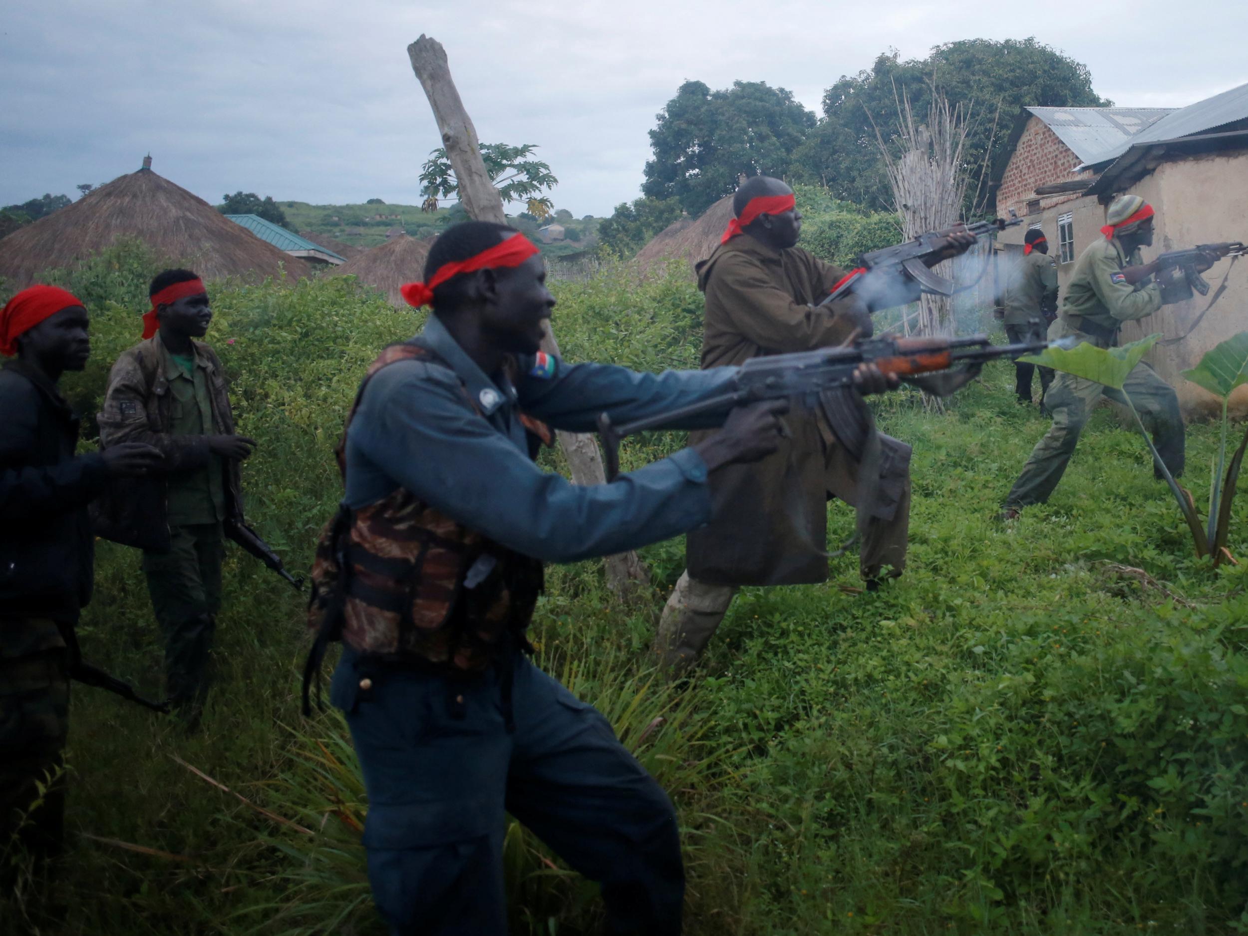 Rebels fighting government troops in Kaya, South Sudan, last month