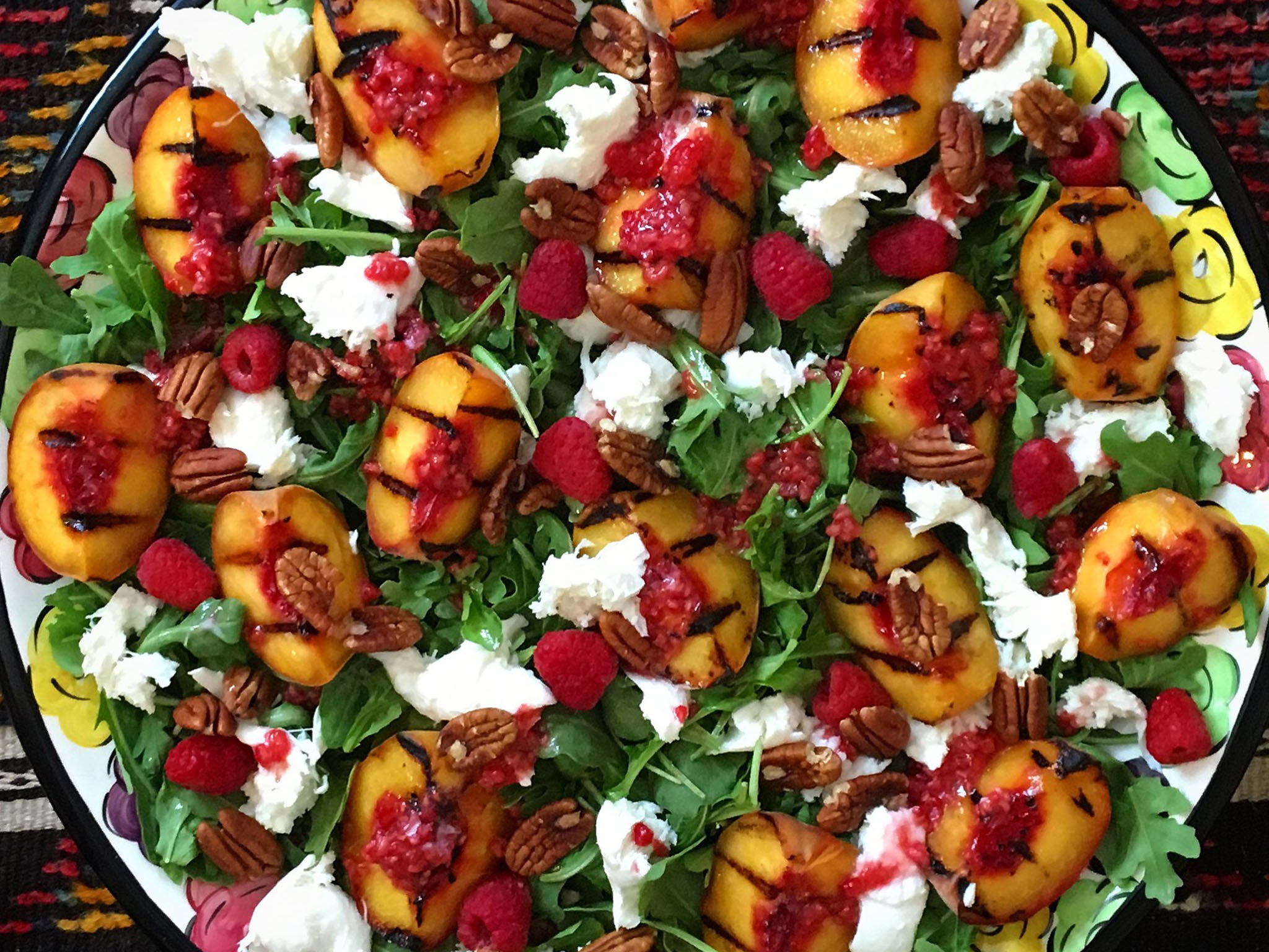 Rocket boosts this fruity and meaty salad in a swirl of crunchy, chewy salty and sweet