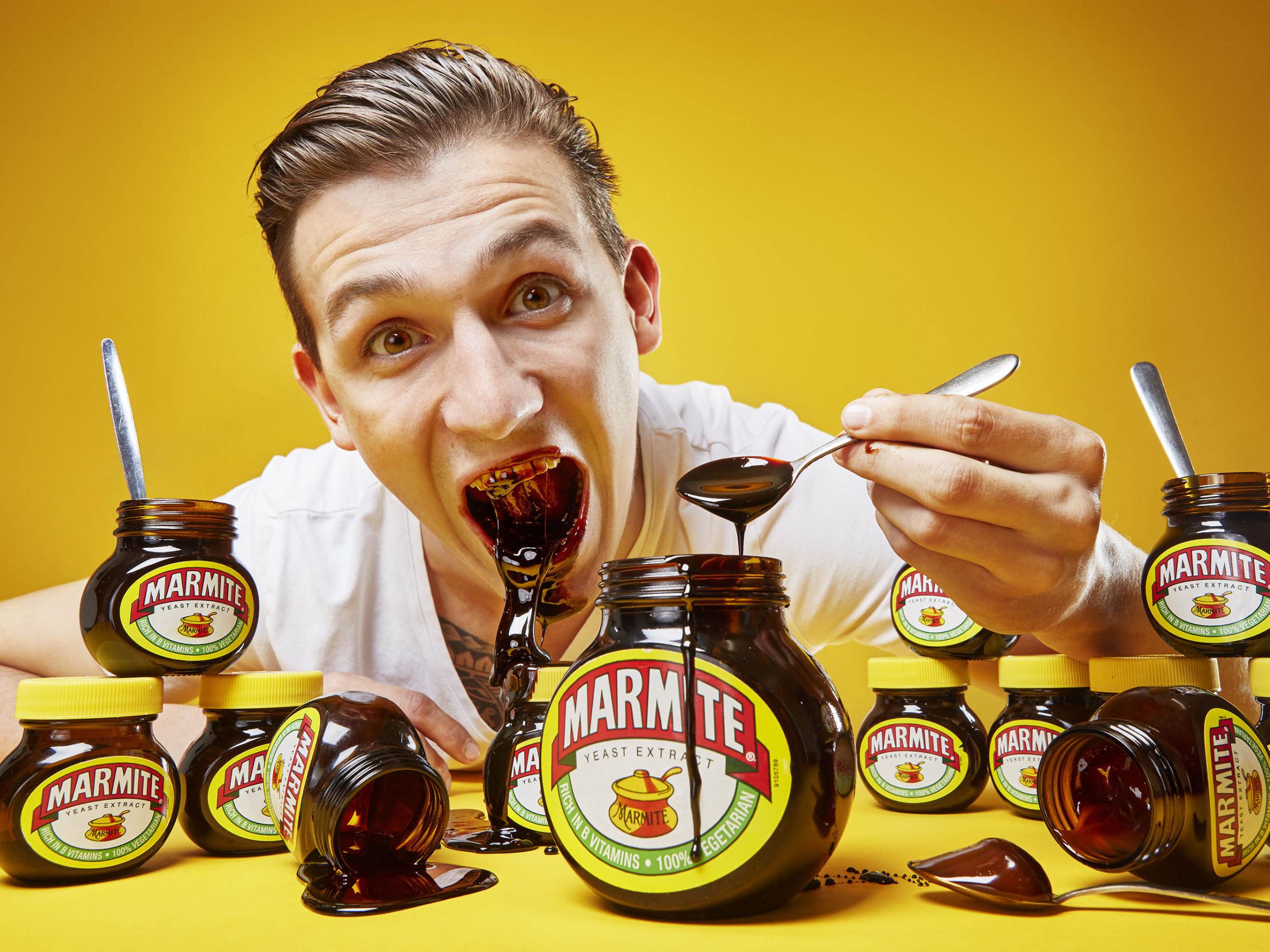 Andre Ortolf holds the record for the most Marmite eaten in one minute in the latest edition of Guinness World Records (PA)