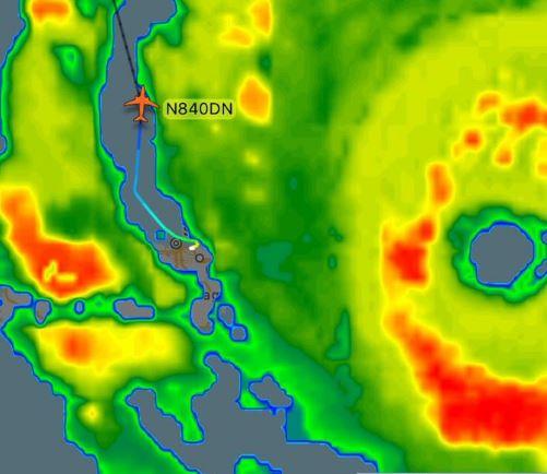 The plane flew between the outer band of the storm and its core