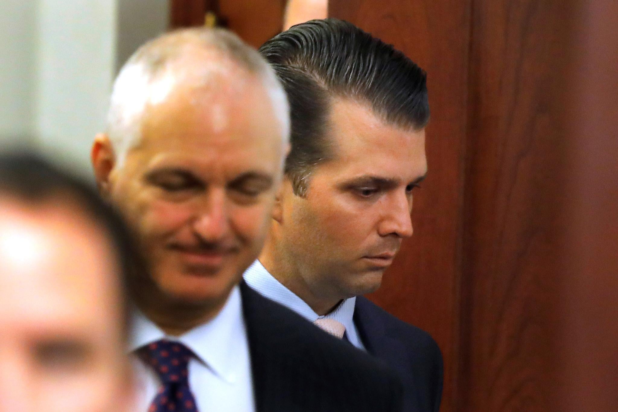 Donald Trump Jr walks out of bathroom during a break as he attends a closed interview with staff members of the Senate Judiciary Committee