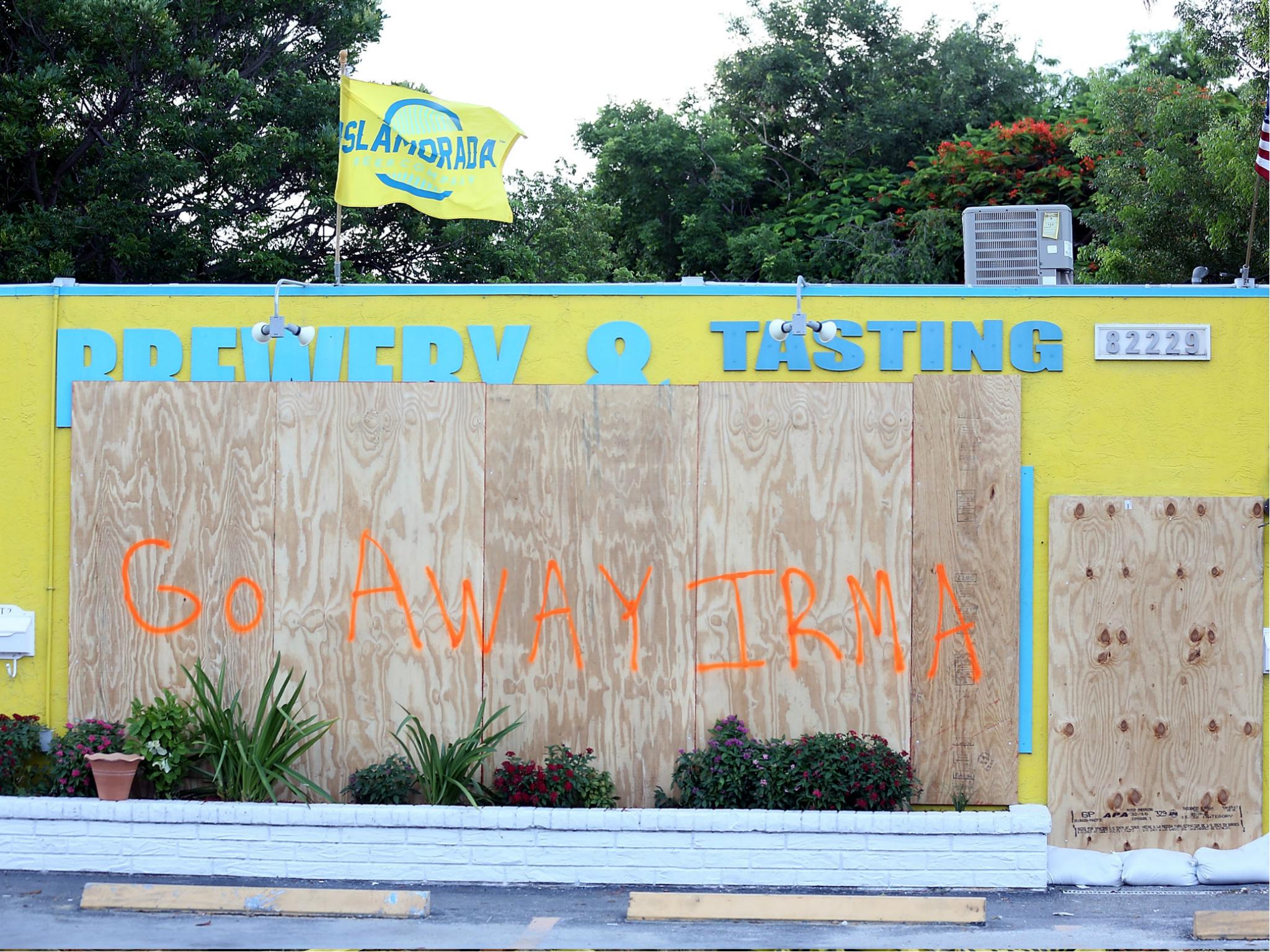 The Islamorada Brewing Company sits vacant and boarded up in the Florida Keys on 8 September 2017.