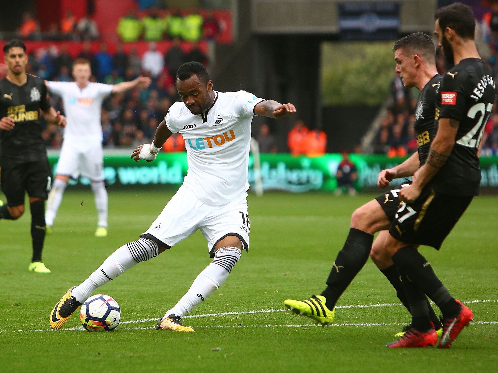 Jordan Ayew takes a shot on goal for the Swans