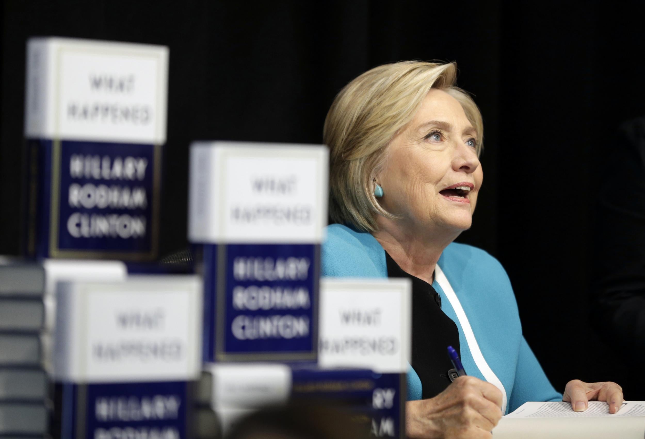 Hillary Rodham Clinton signs copies of her book "What Happened" at a book store in New York