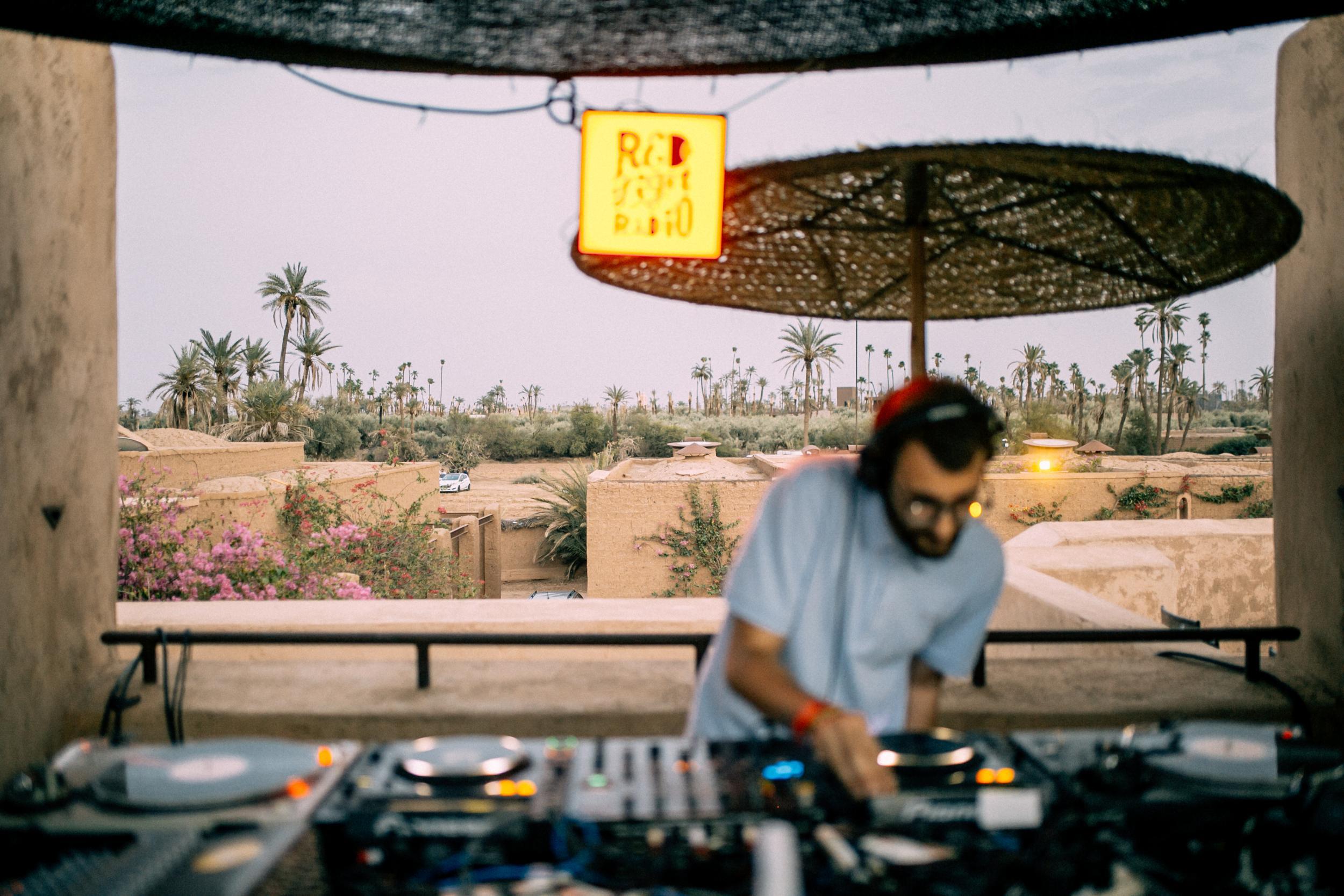 Driss Bennis rocks some cutting-edge headwear at the Red Light Radio stage (Laisa Maria)