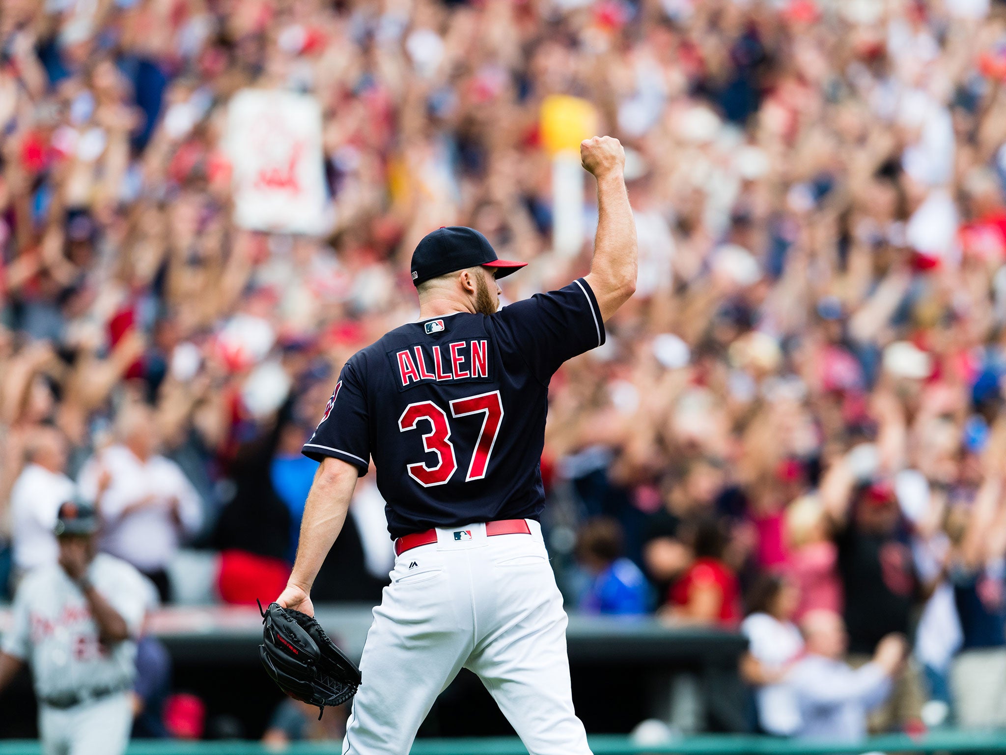 Cody Allen celebrates after beating the Detroit Tigers