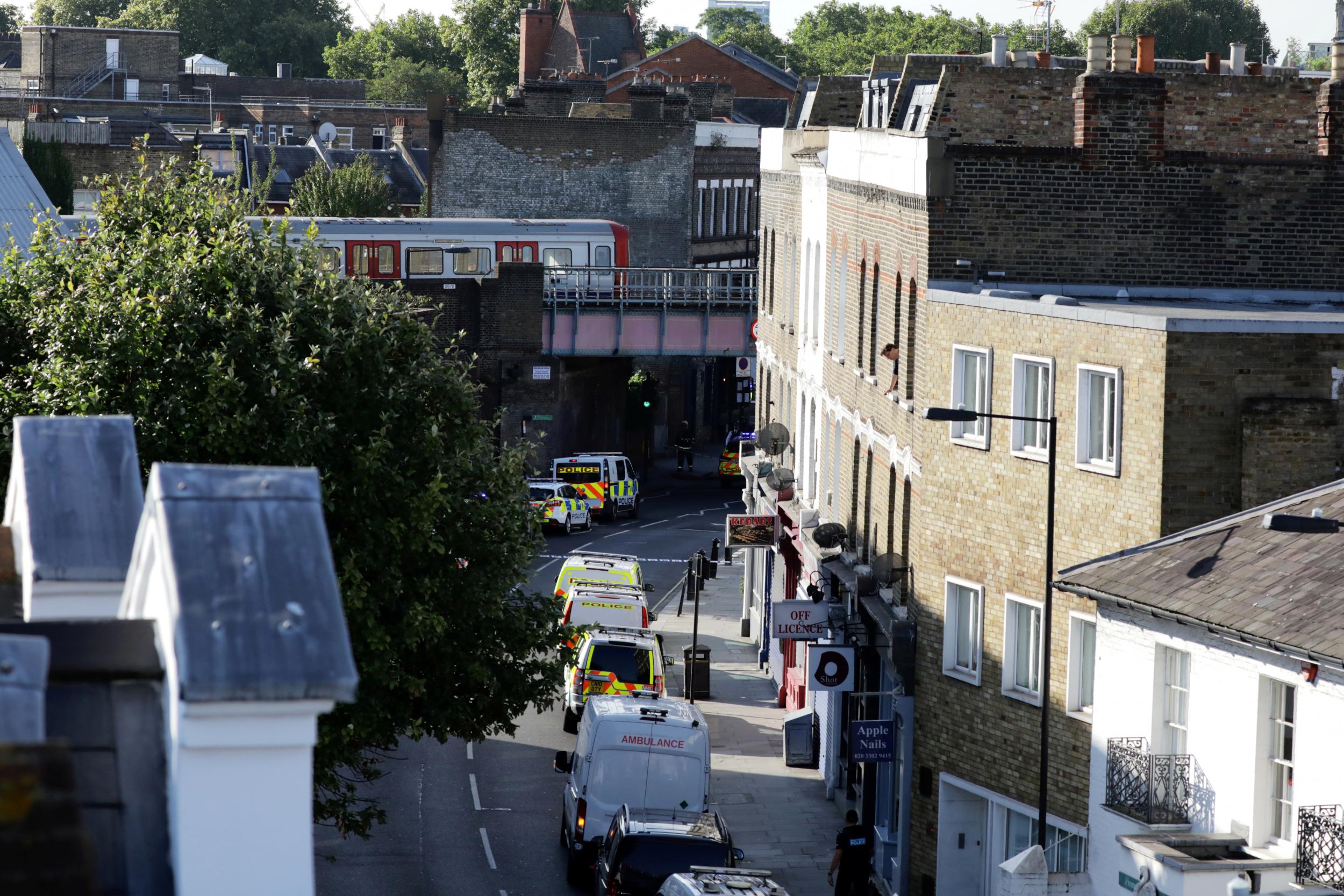 Police have evacuated homes near Parsons Green tube station