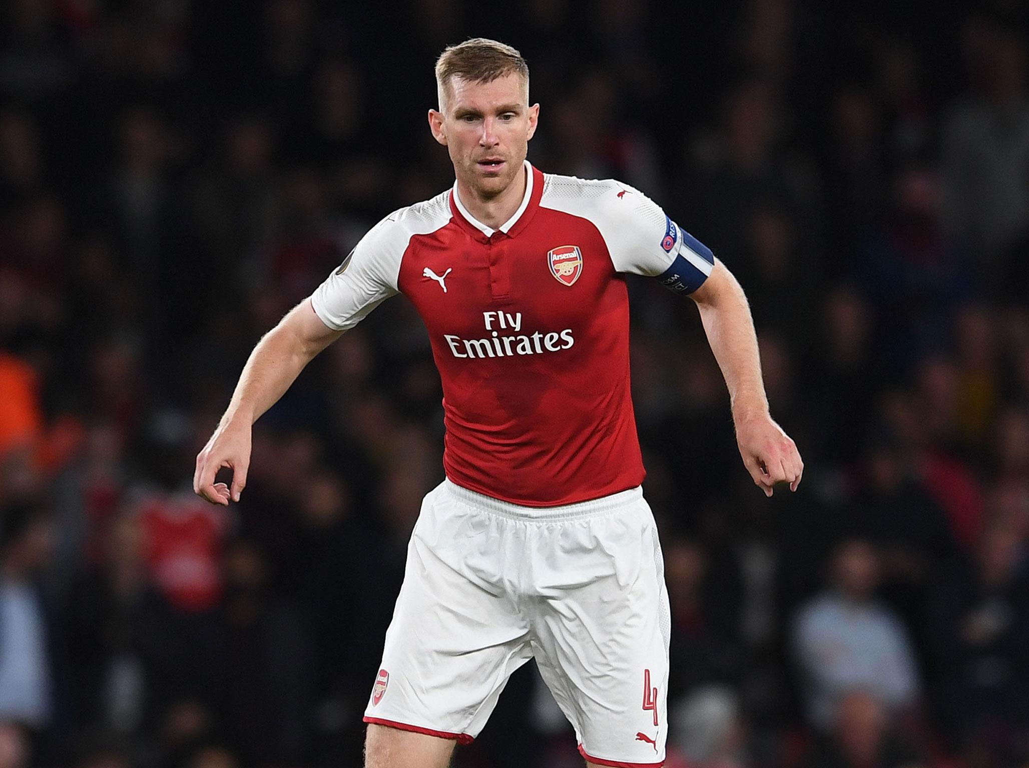 Per Mertesacker was a fan of the atmosphere inside the Emirates on Thursday night