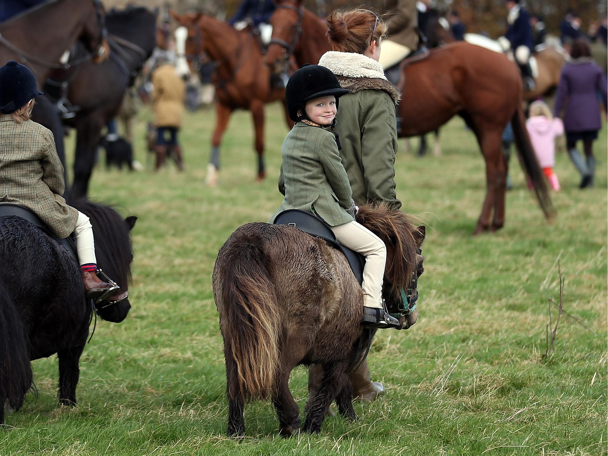 A young rider from the Duke of Beaufort’s Hunt arrives for an opening meeting of the season at Worcester Lodge