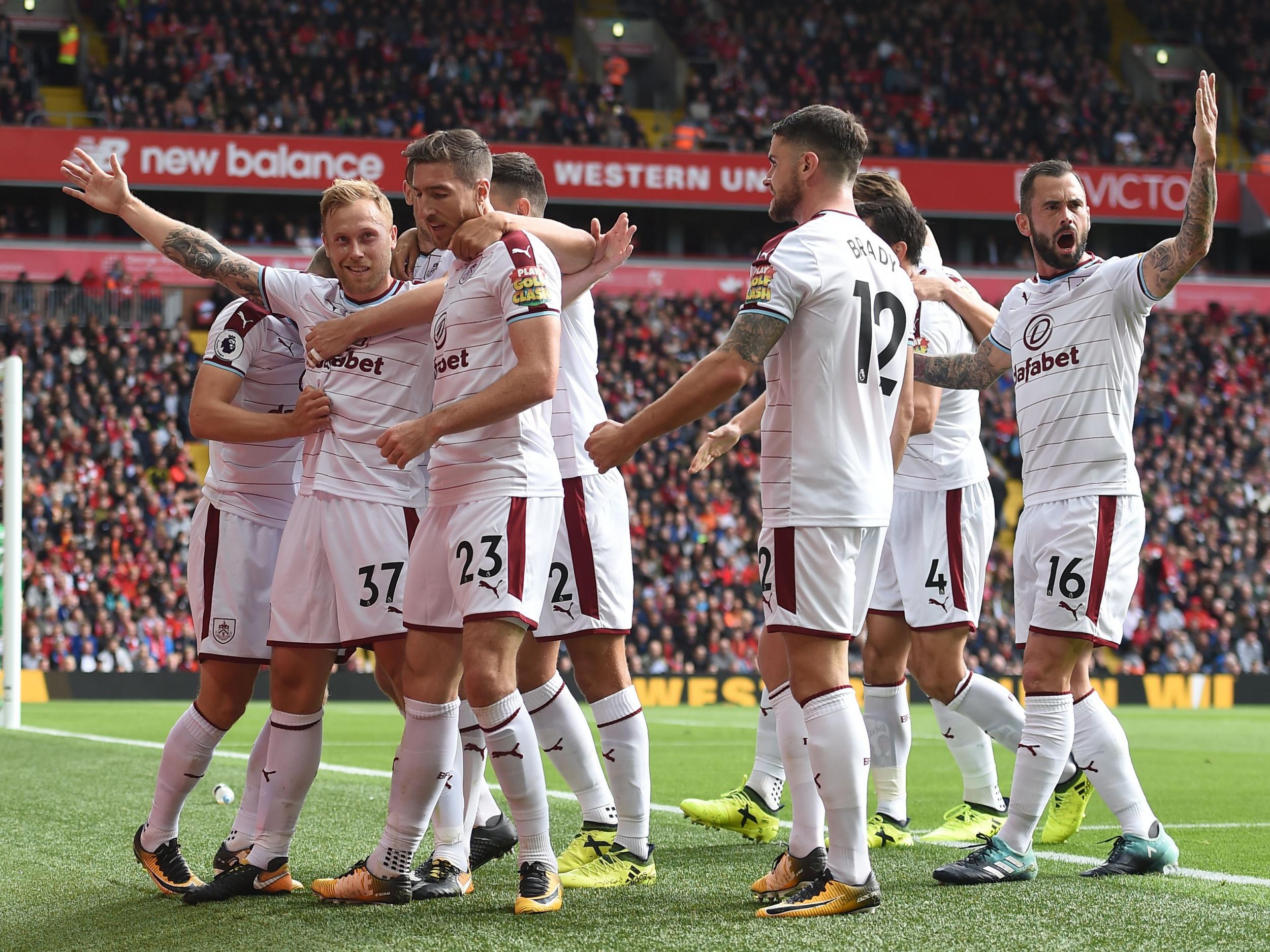 Scott Arfield (left) opened the scoring for Burnley