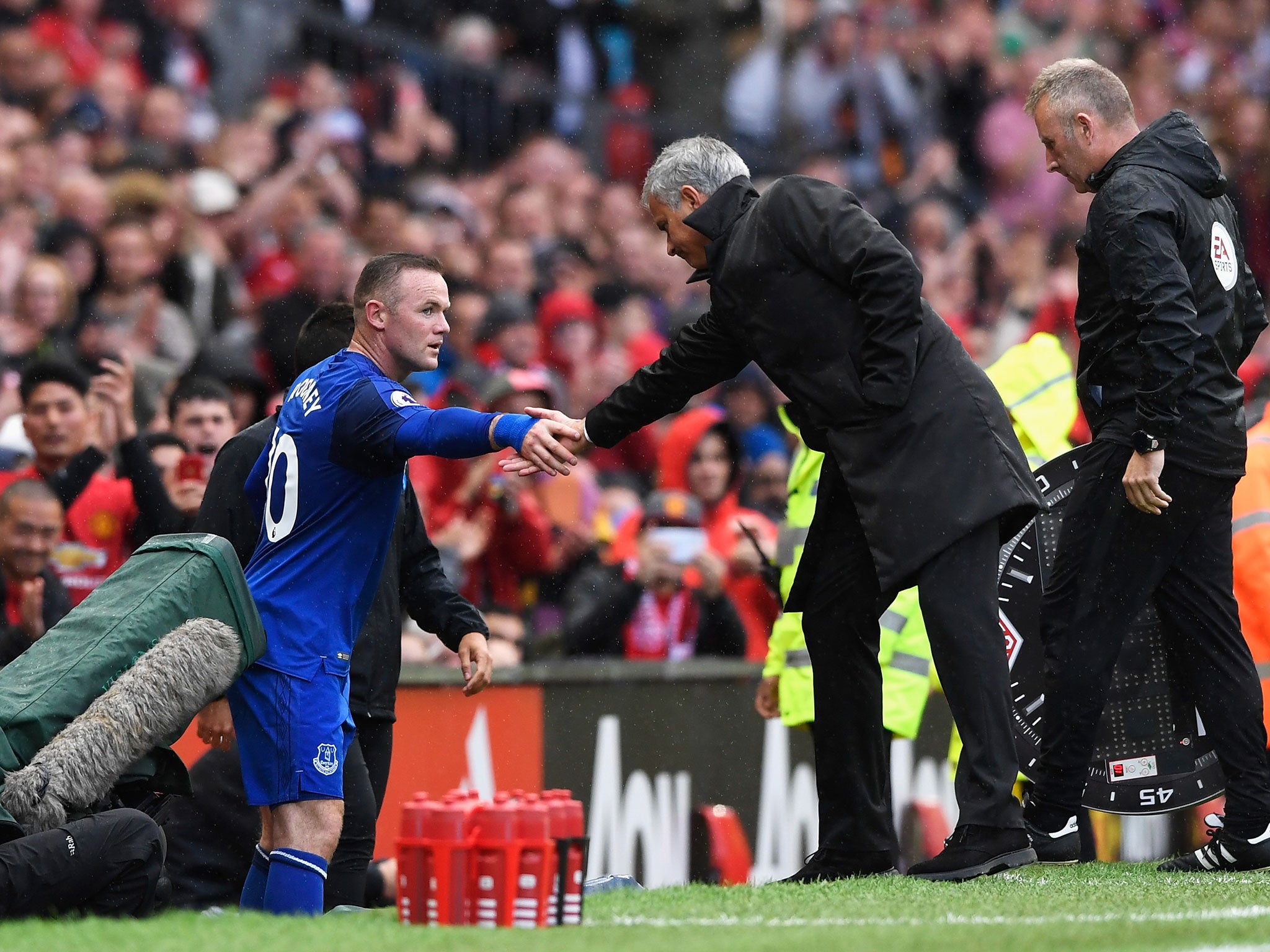 Wayne Rooney with his old manager after being substituted