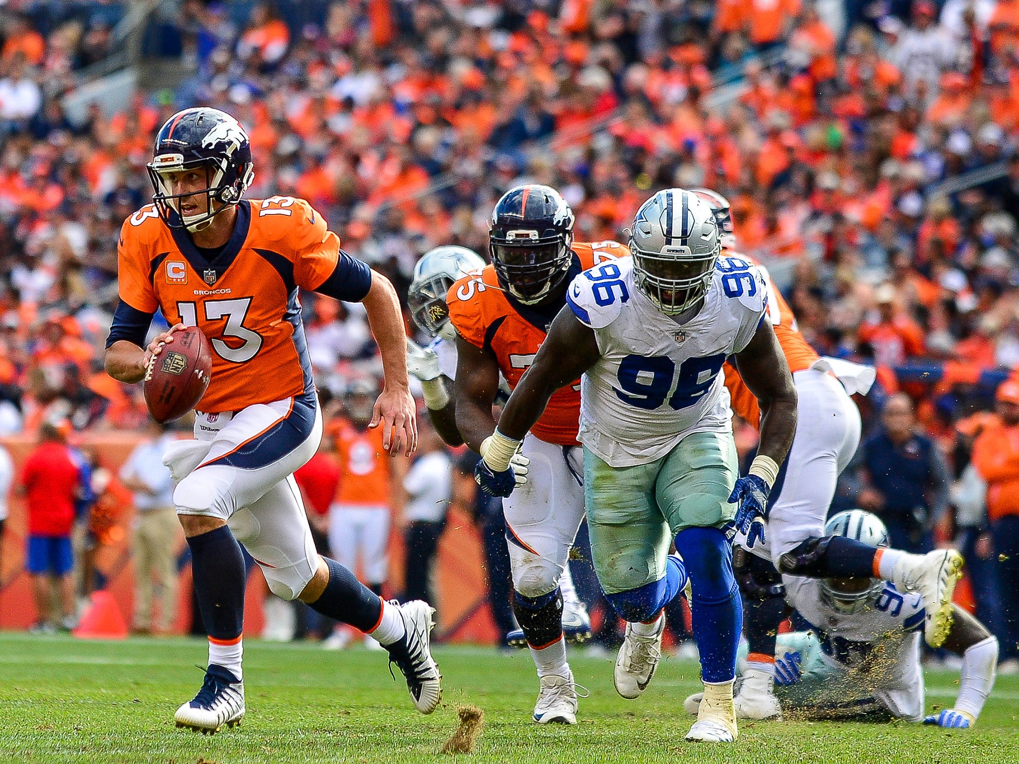 Trevor Siemian threw a career-best four touchdowns as the Broncos beat the Cowboys