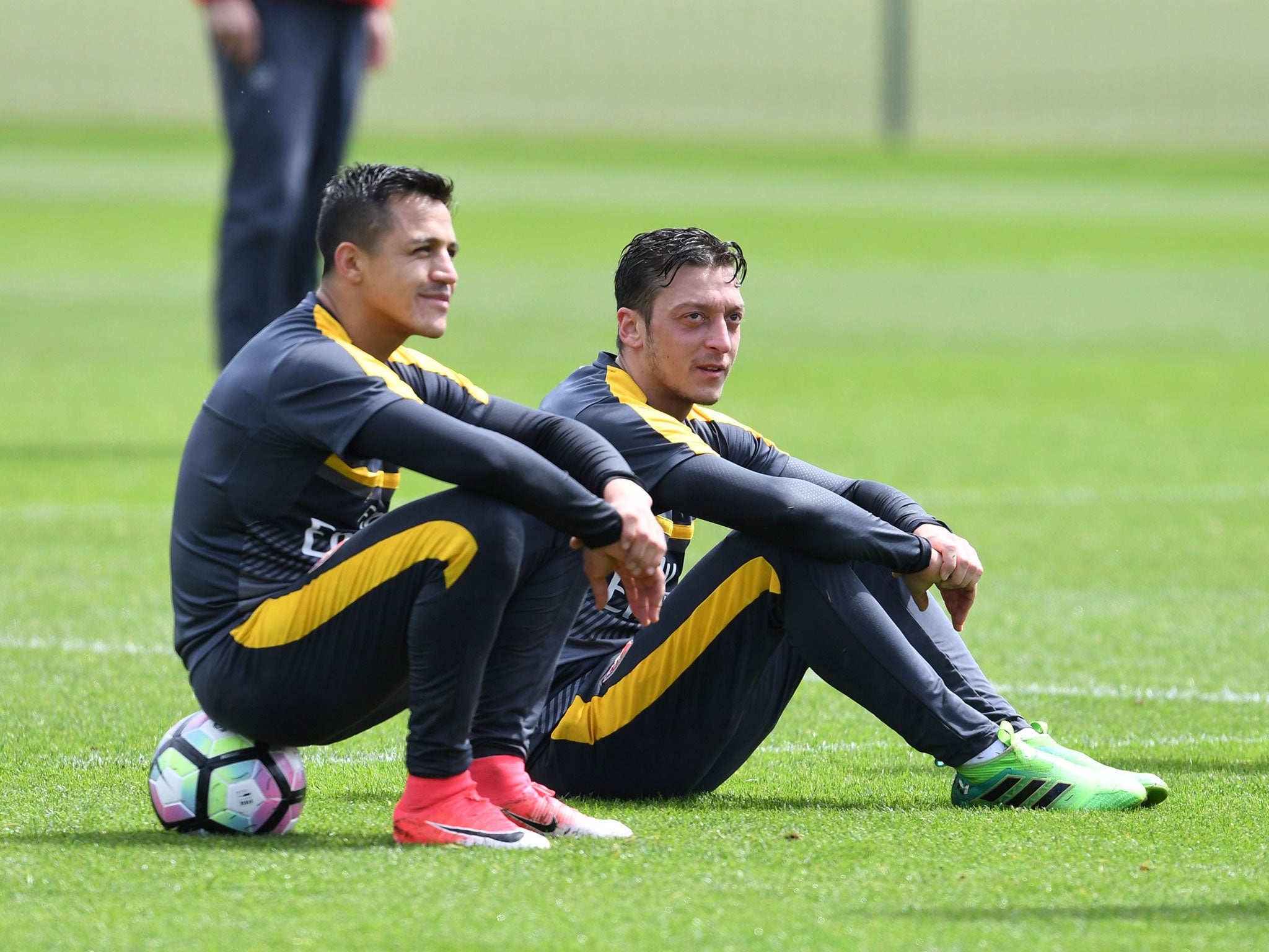 The two players in training together at Arsenal