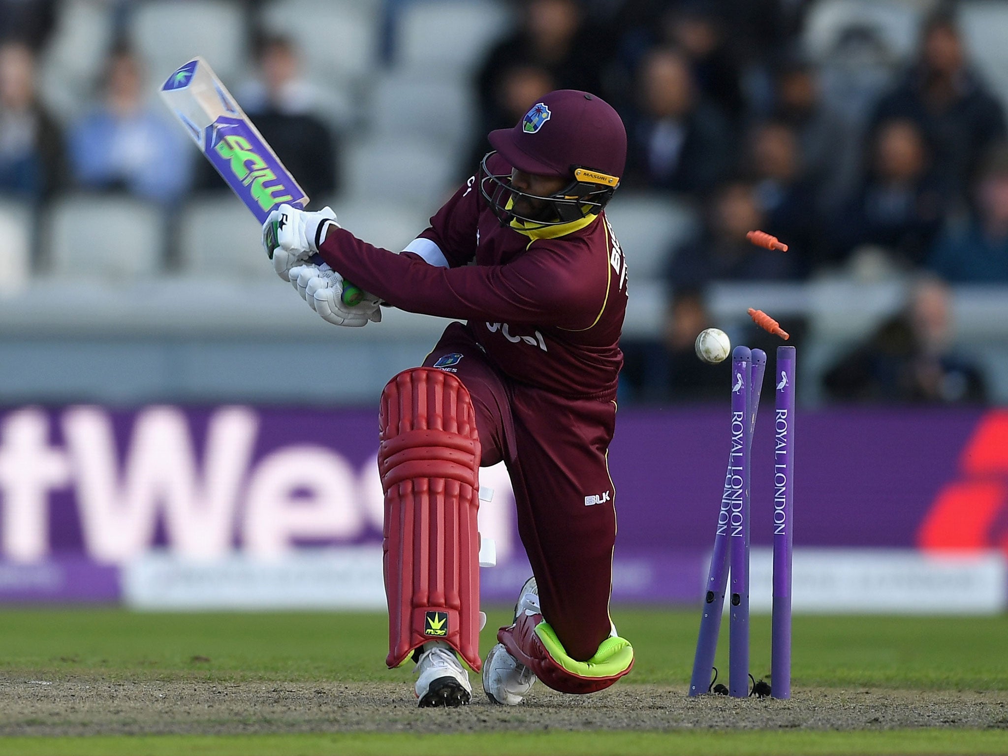 Devendra Bishoo is bowled by David Willey