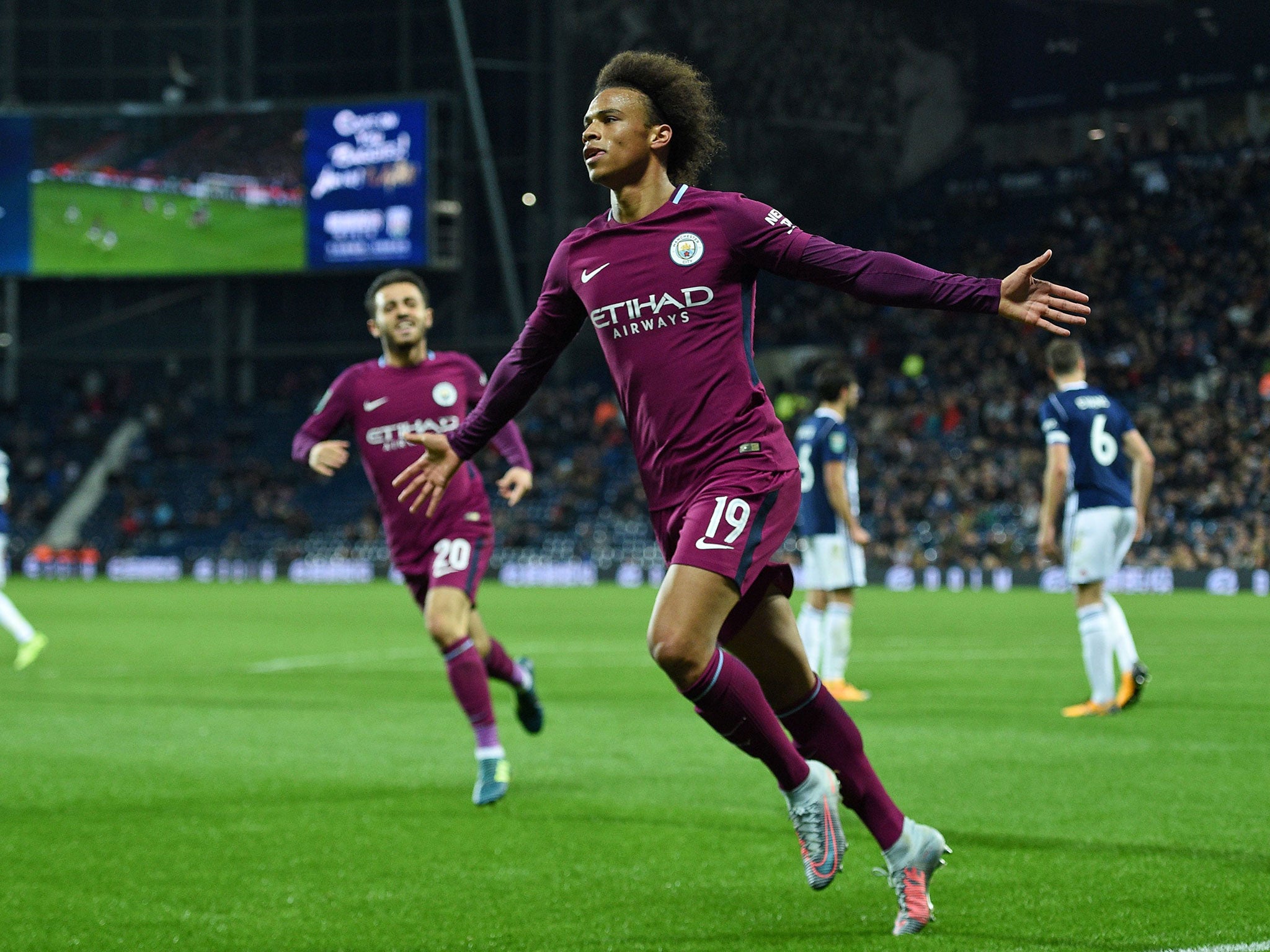 Leroy Sane celebrates his winner for City