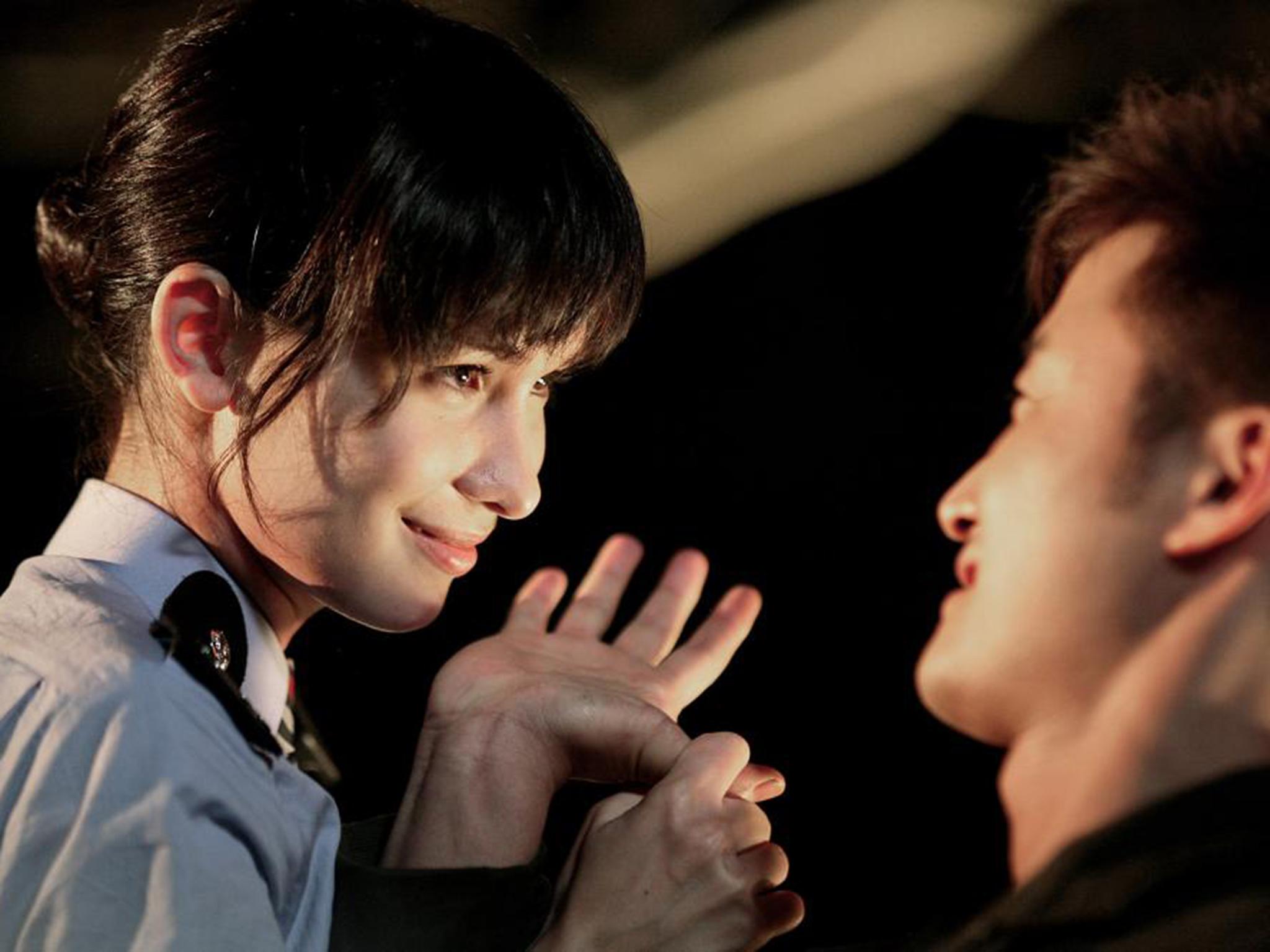 Jade as Hiu Wor with Wu Jing as Bo Tong Lam in 'Legendary Assassin' (2008)