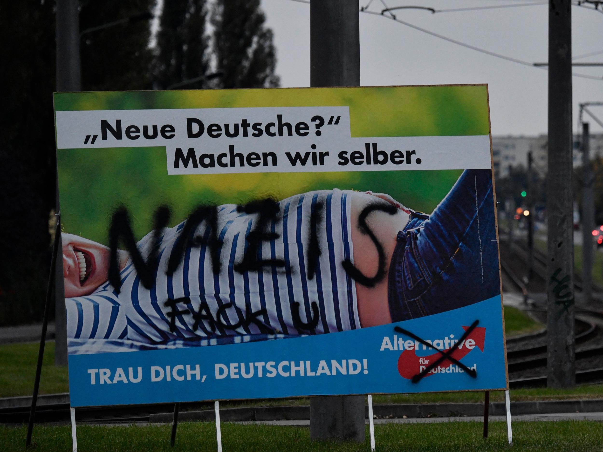 A vandalised Alternative für Deutschland campaign poster in Berlin