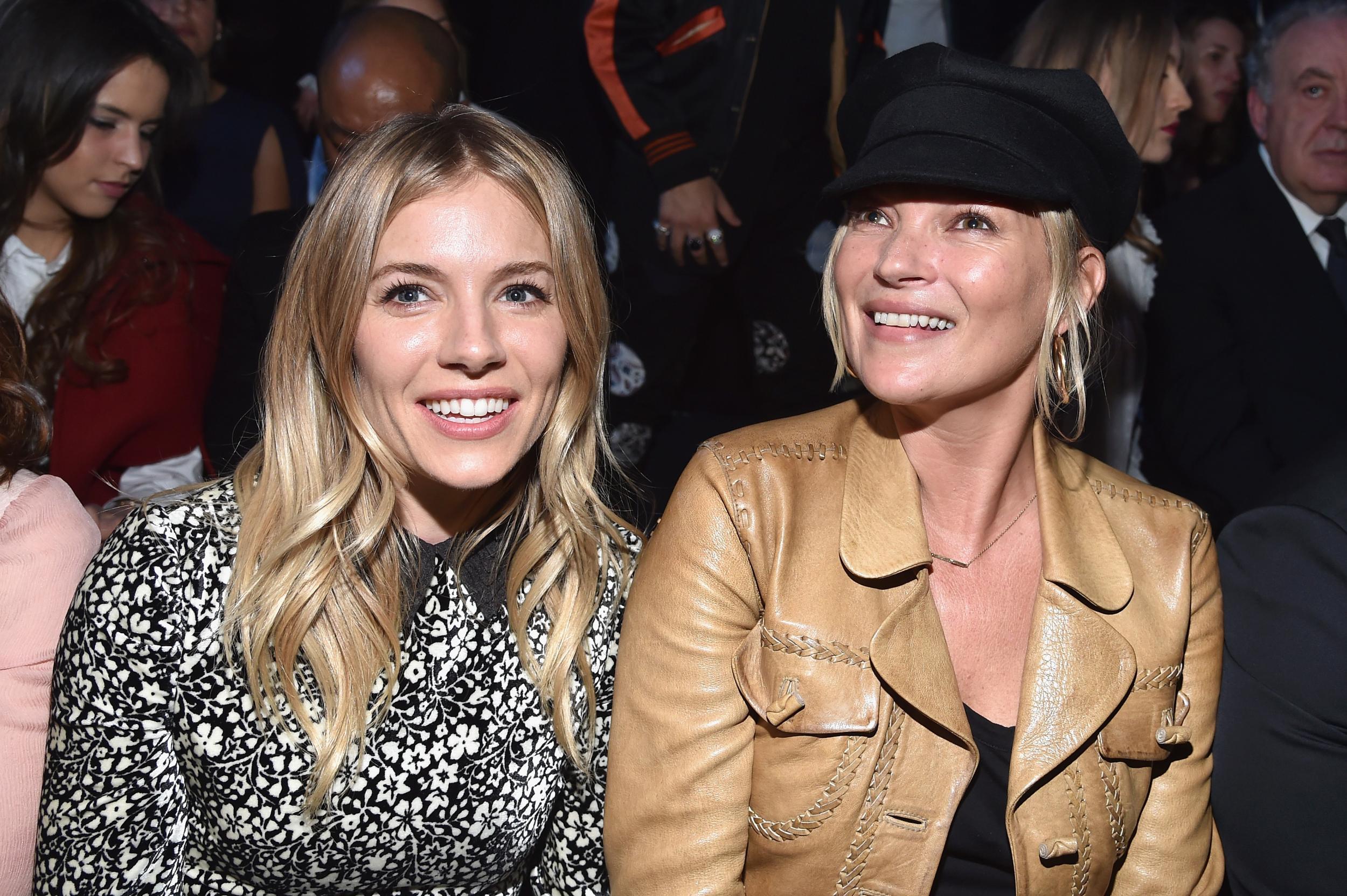 Sienna Miller and Kate Moss sitting in the front row at Dior AW17