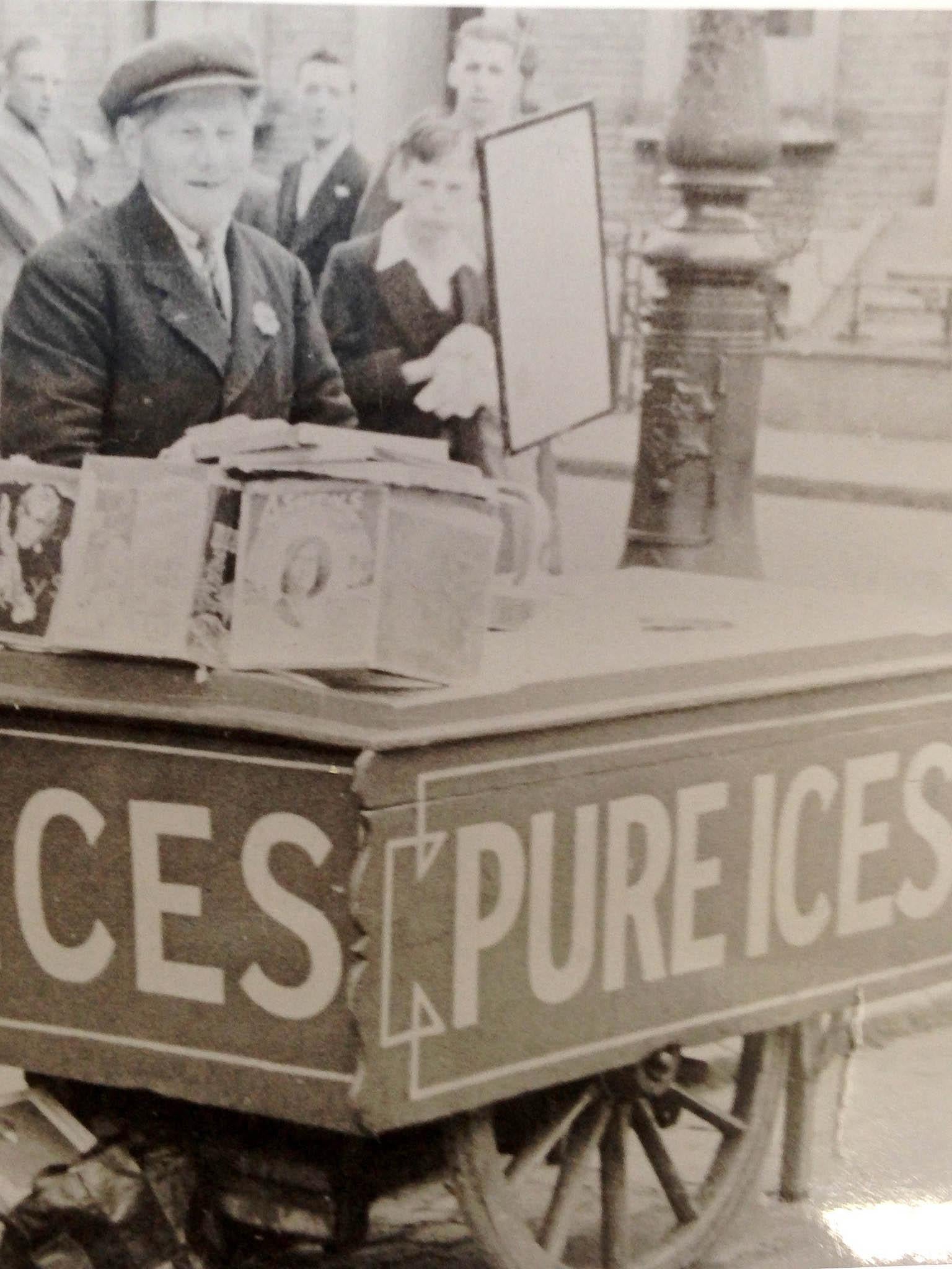 One of the road’s market stalls in 1908, before the stratospheric rise of supermarket shopping culture