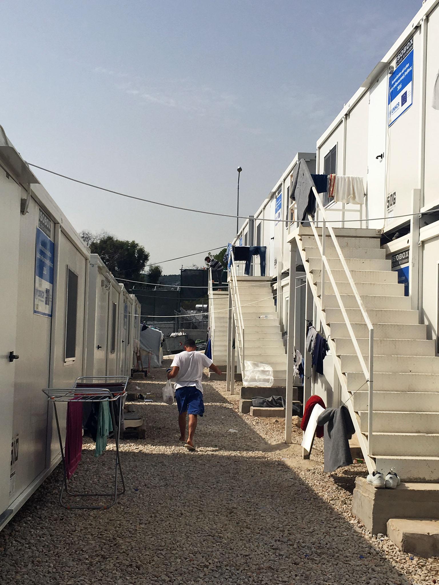 Some refugees live in shipping containers at the refugee camp, while others live in tents