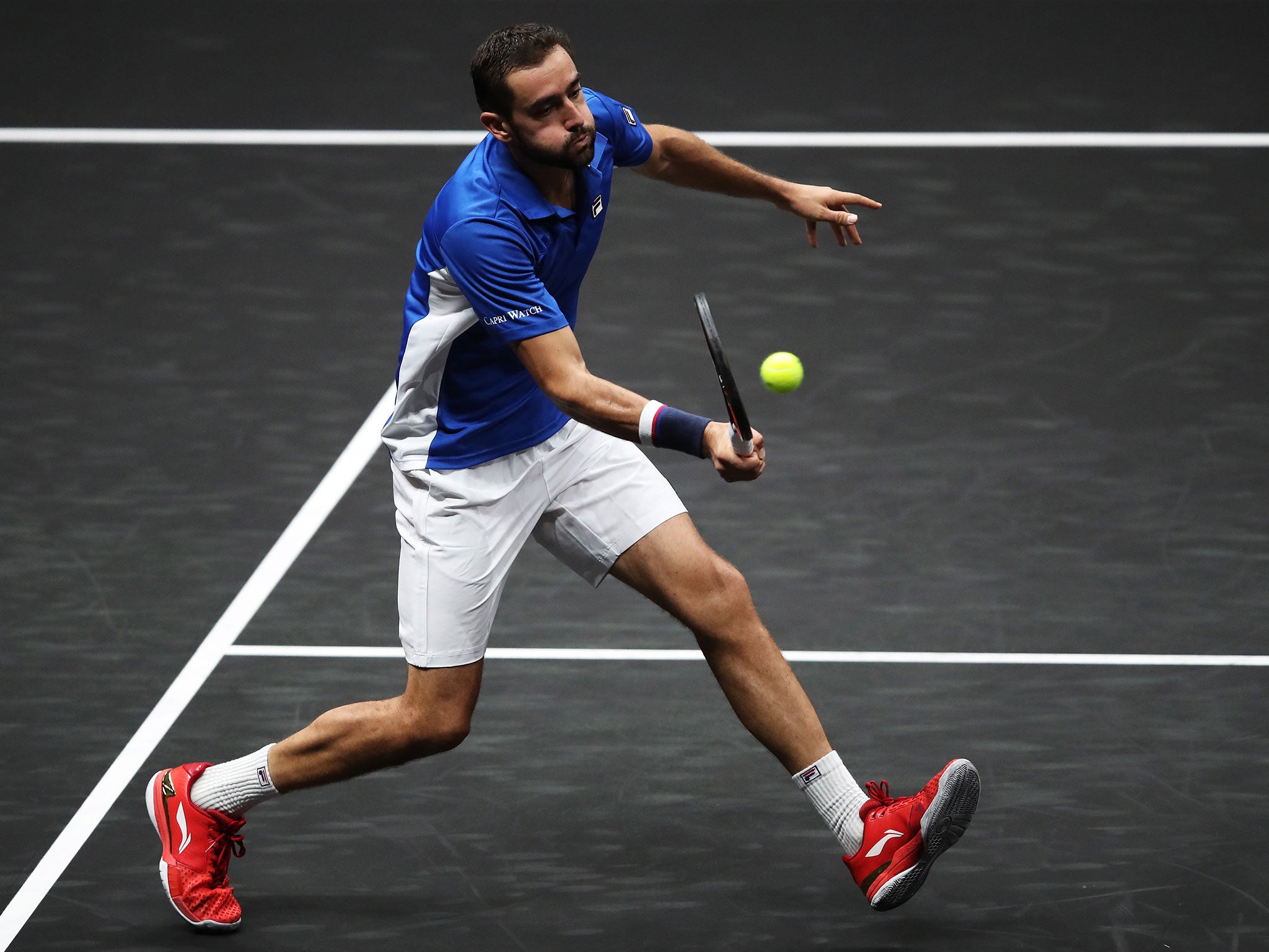 Marin Cilic in action against Frances Tiafoe