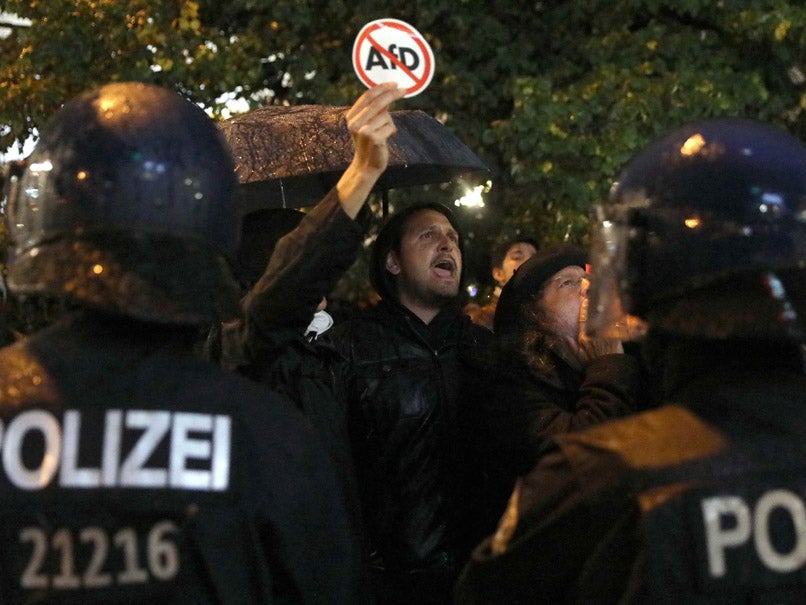 Demonstrators protest against the anti-immigration party Alternative fuer Deutschland (AfD) after German general election