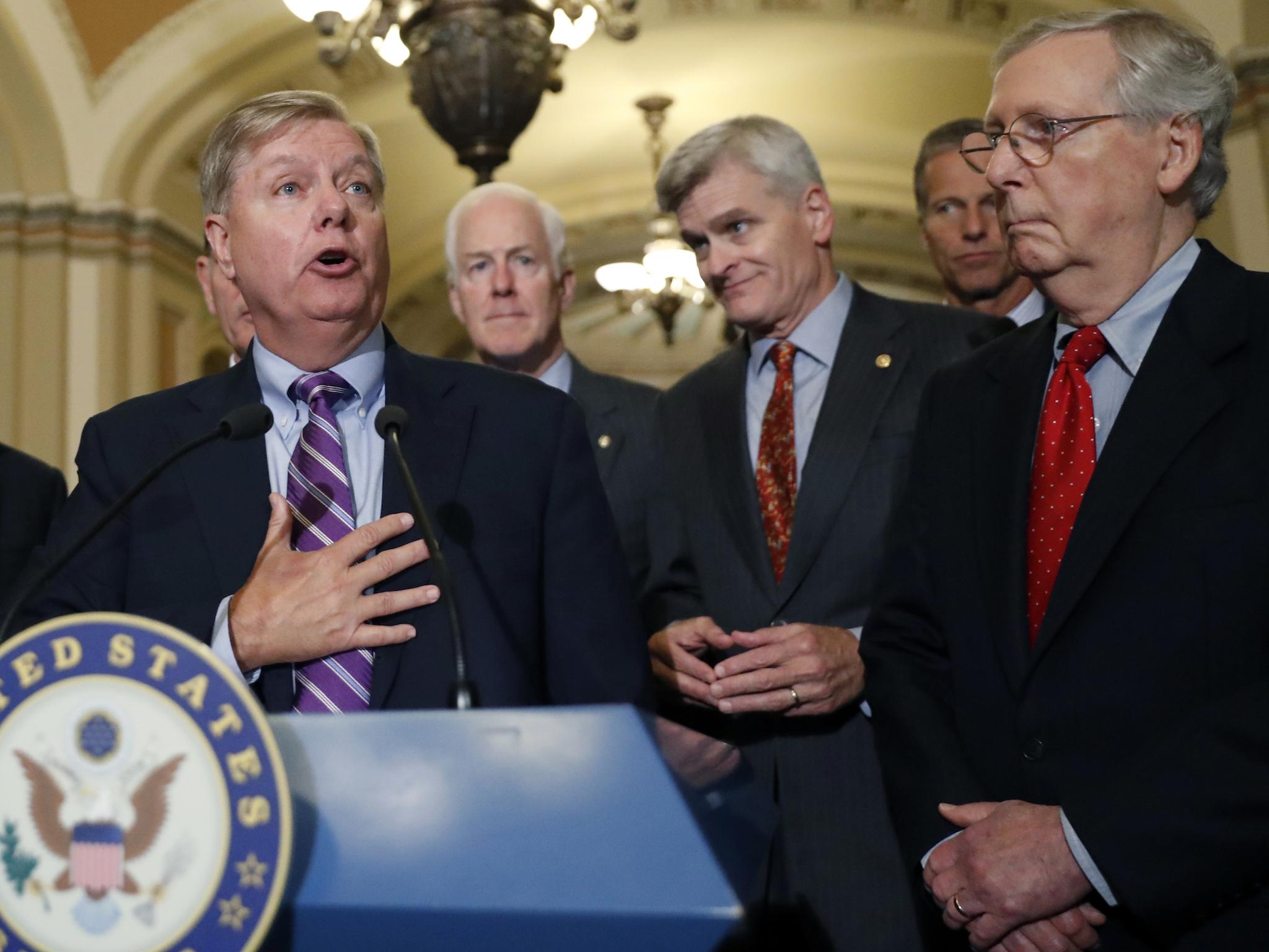 Senator Lindsey Graham, second from left, speaks to the media, accompanied by Senators Roy Blunt, Senate Majority Whip John Cornyn, Senator Bill Cassidy, Senator John Thune, and Senate Majority Leader Mitch McConnell