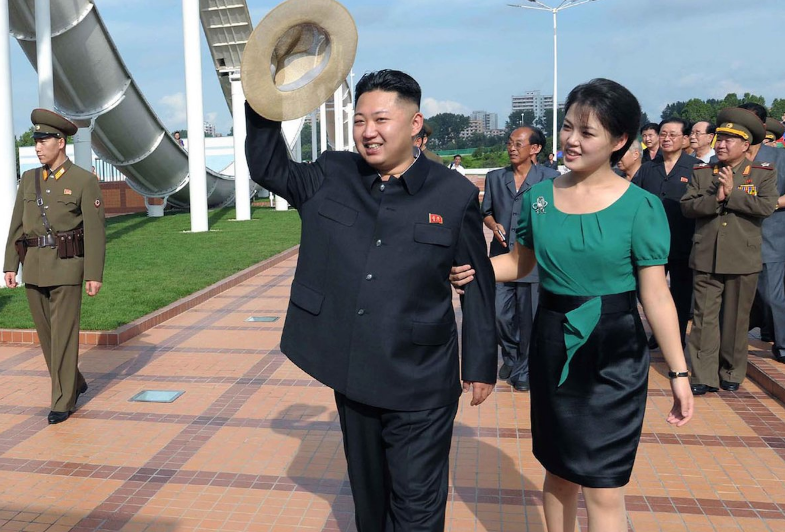 Mr Kim and Ms Ri attend the opening ceremony of the Rungna People’s Pleasure Ground on Rungna Islet along the Taedong River in Pyongyang on 25 July, 2012 (AP)