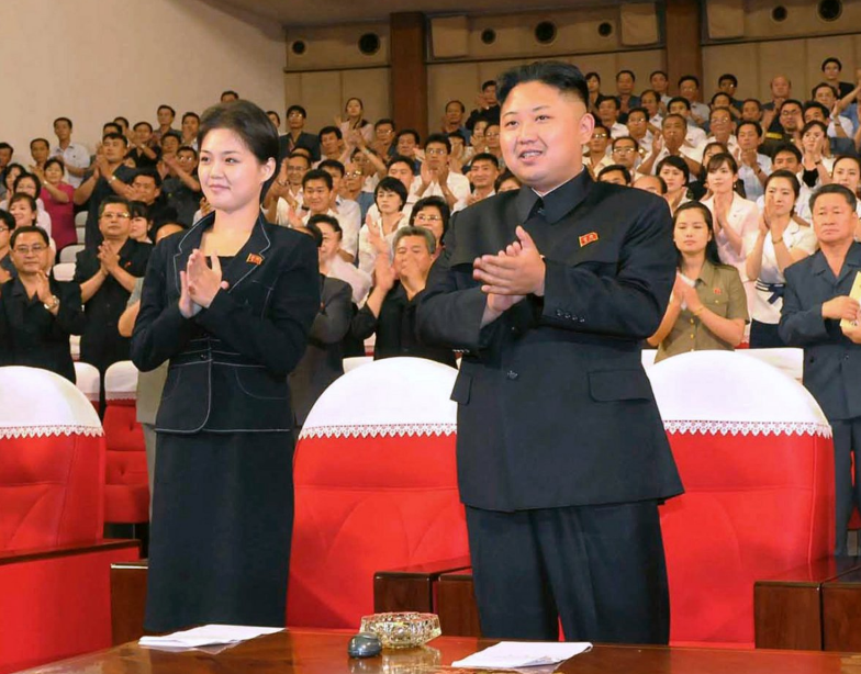 The couple applaud during a performance by the newly formed Moranbong band in Pyongyang on 9 July, 2012 (Reuters)