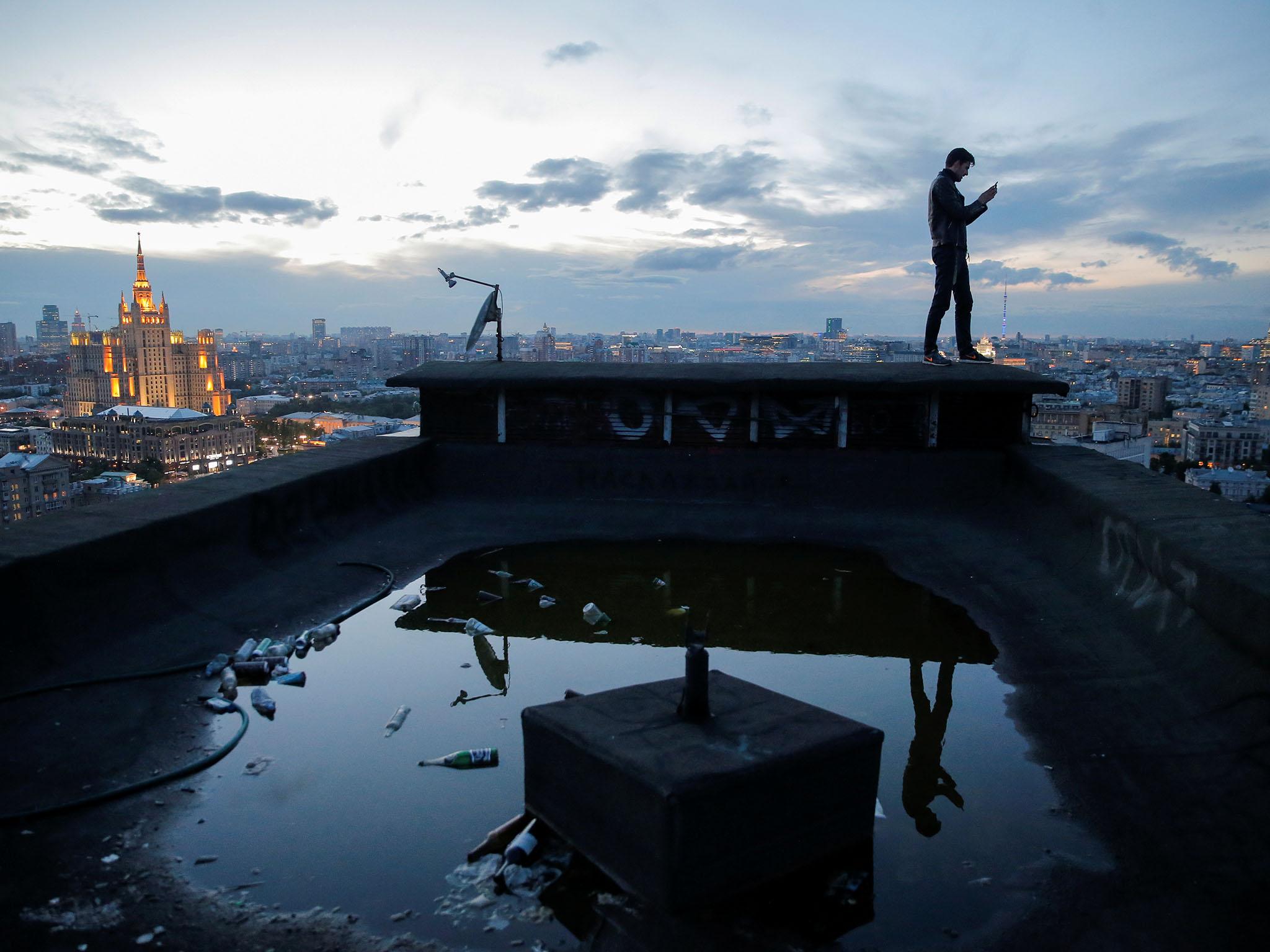 ‘Roofers’ like Sergii Rodionov enjoy the thrill of feeling like they’re on top of the world