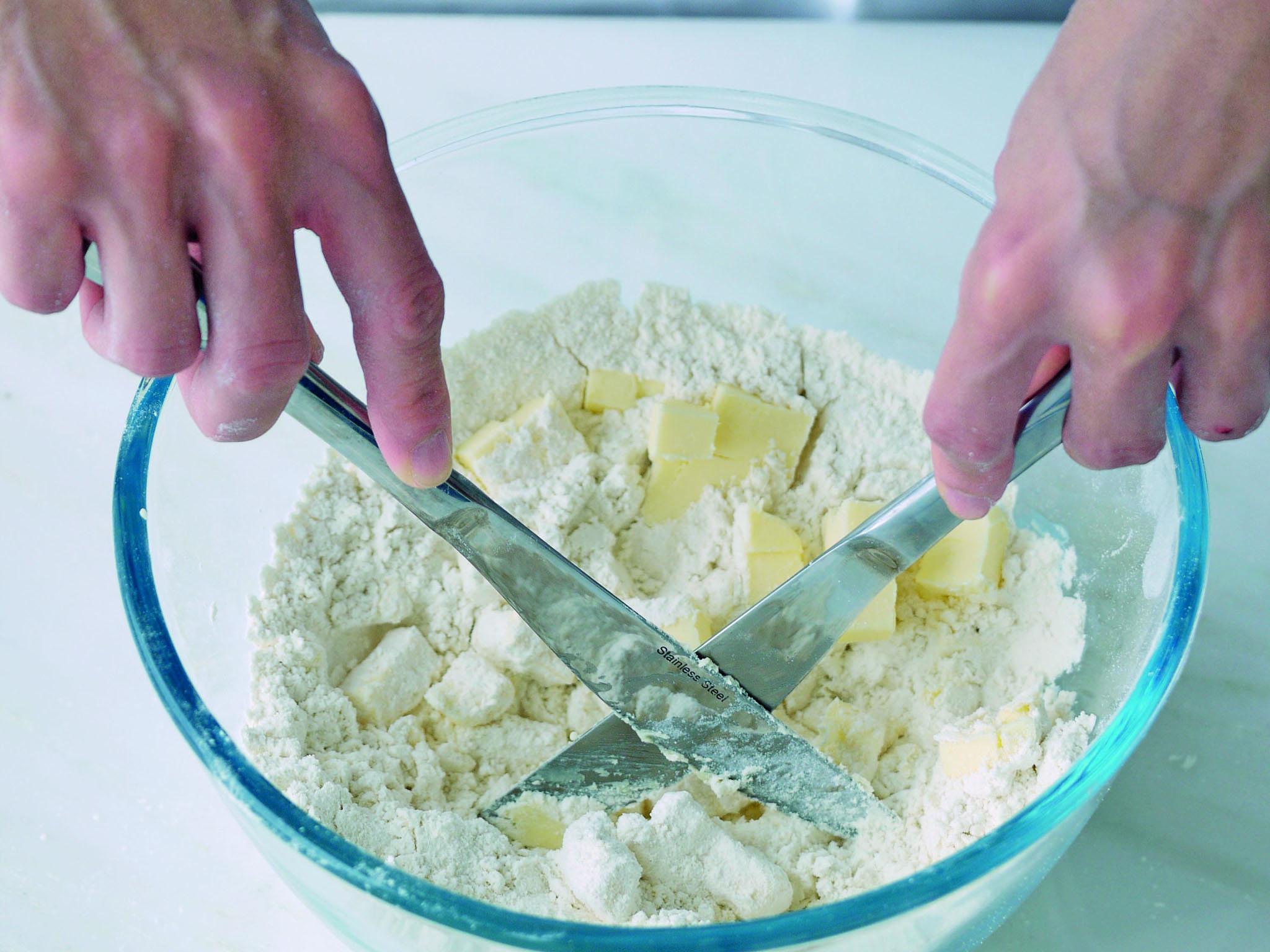 2. Cut butter into small pieces and add to flour. Using 2 cutlery knives in a scissor motion, cut the butter into the flour, keeping the 2 knives in contact – using knives rather than fingers helps to keep the butter and flour cool