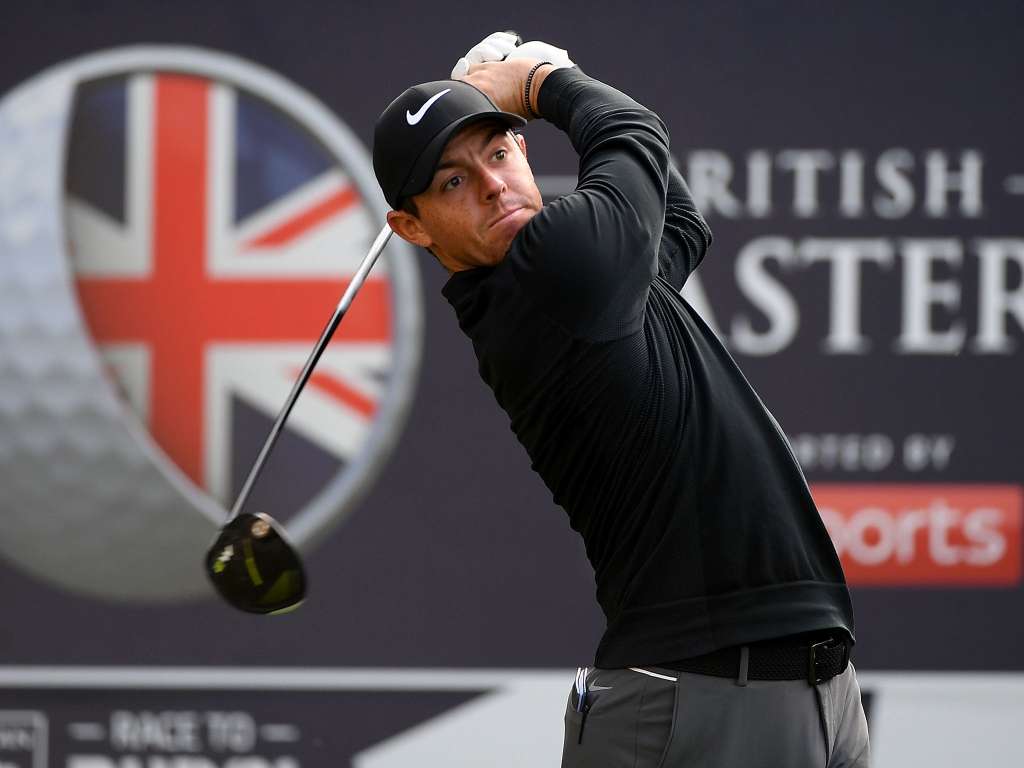 Rory McIlroy hits his tee shot on the 15th hole