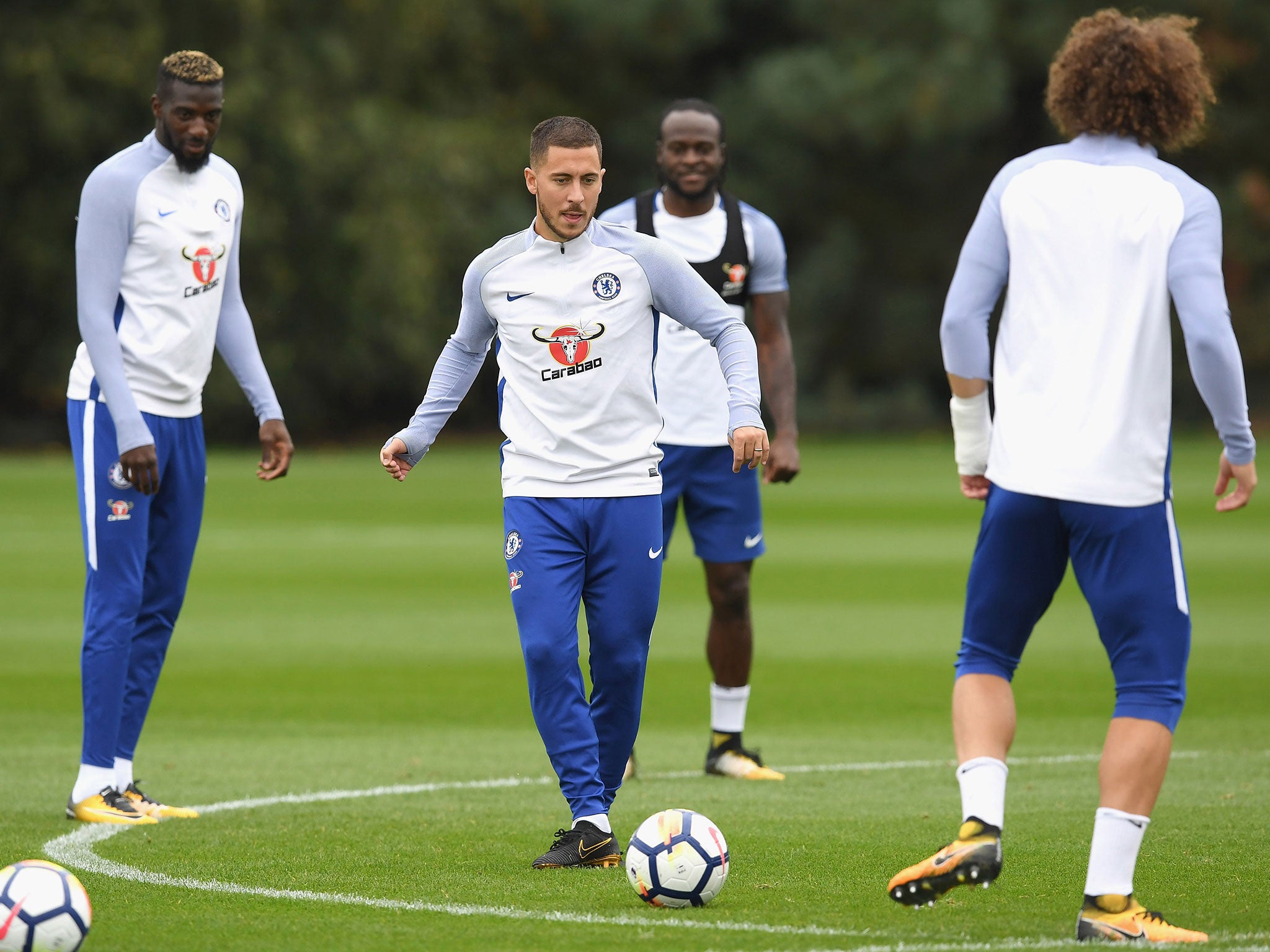 The Belgian in training with his Chelsea teammates at Cobham