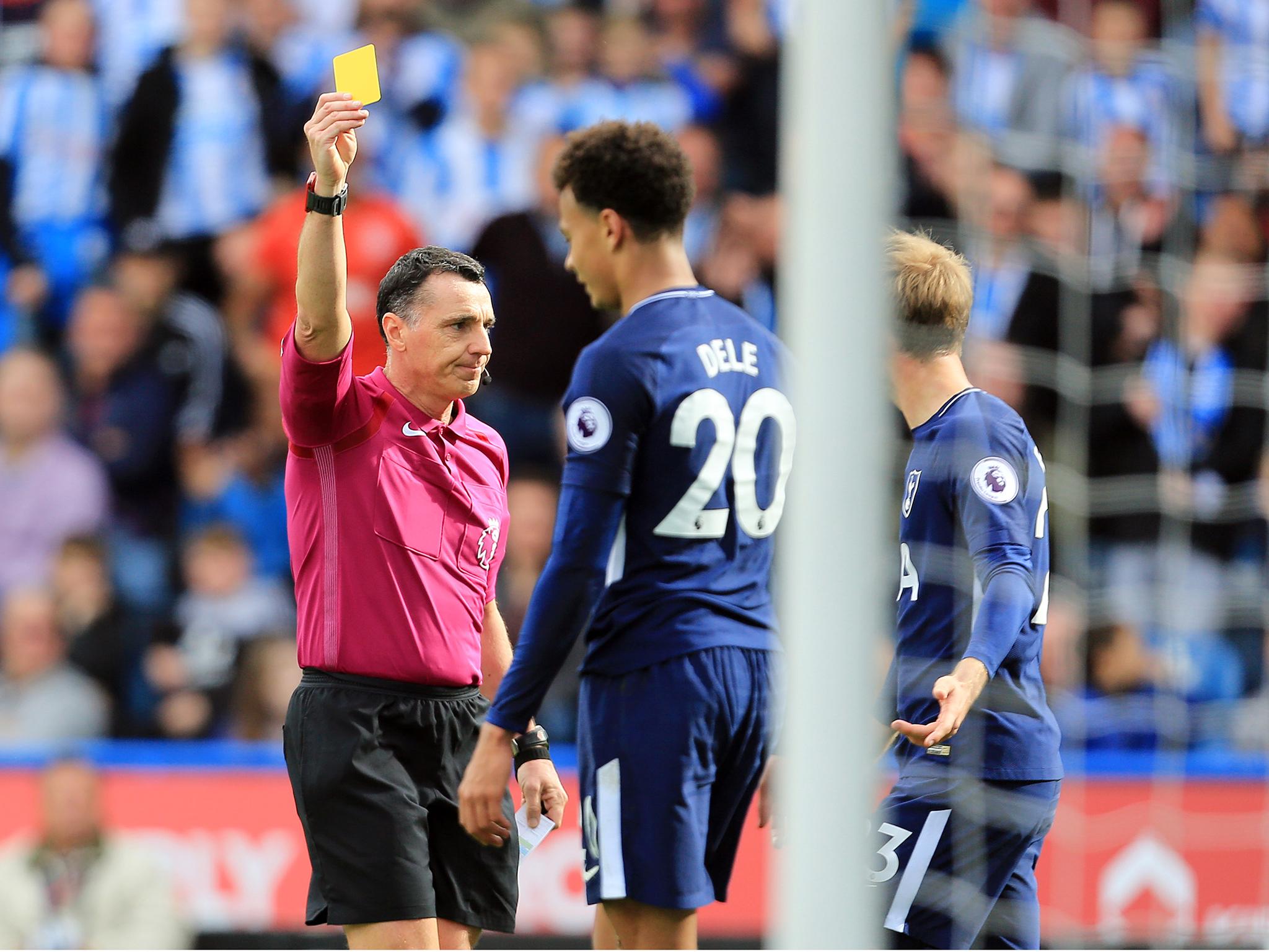 Dele Alli was booked for diving in the second half of Tottenham's 4-0 win over Huddersfield