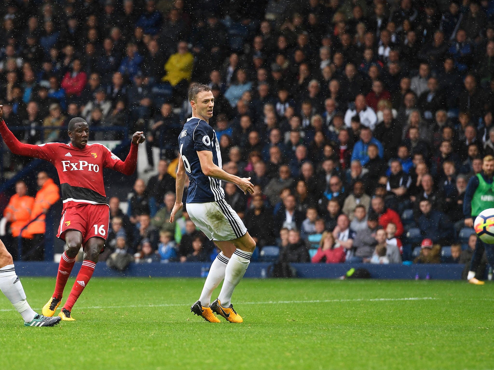 Abdoulaye Doucoure curls in Watford's first goal to cut the lead