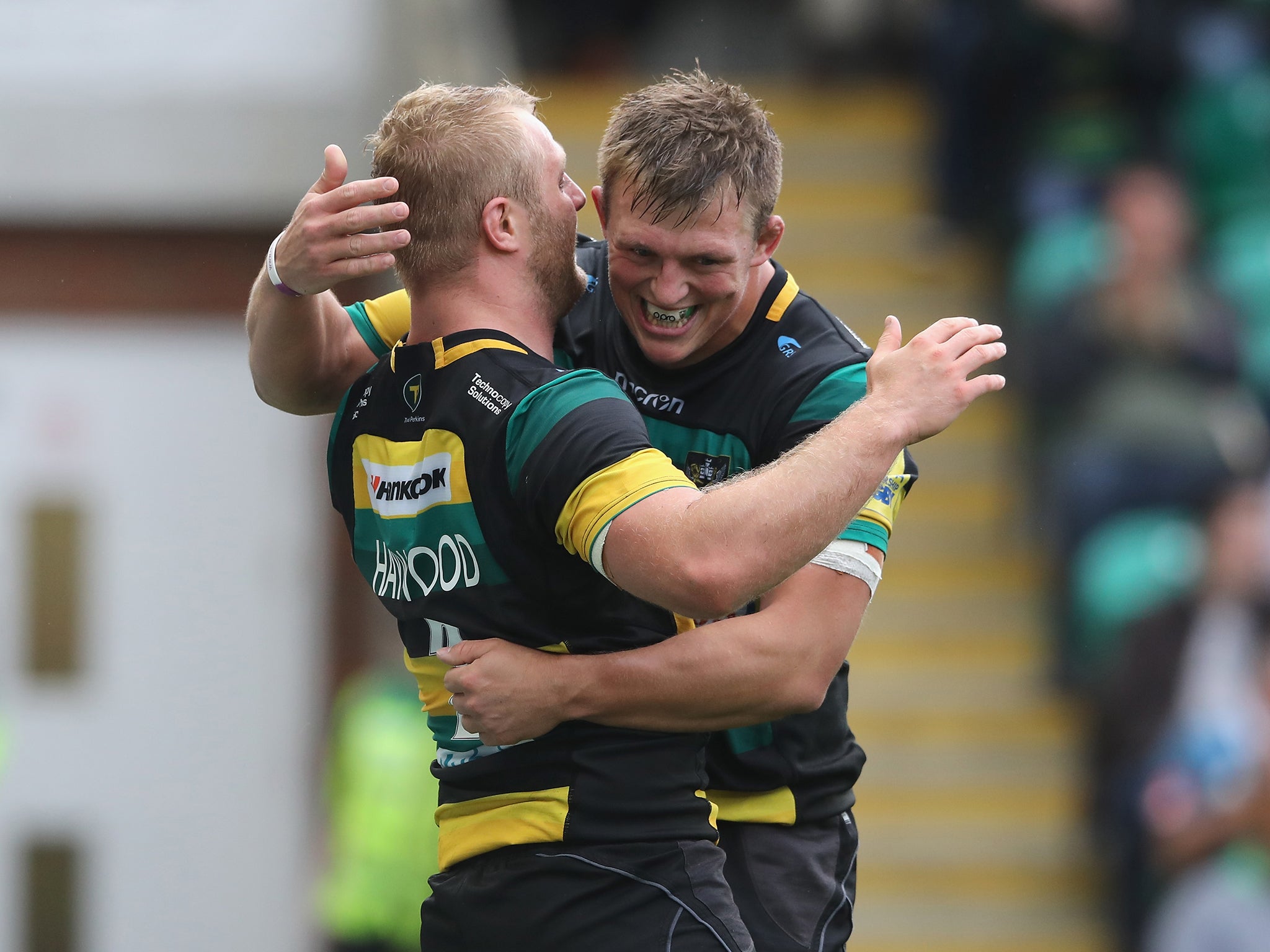 Mikey Haywood celebrates with Alex Waller after scoring a try