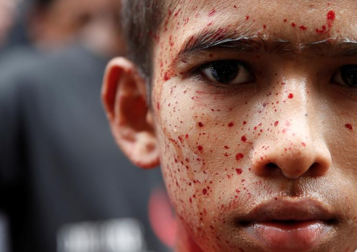 Shia Muslims beat themselves at a mosque during a religious festival marking Ashura, in central Yangon, Myanmar on 1 October 2017