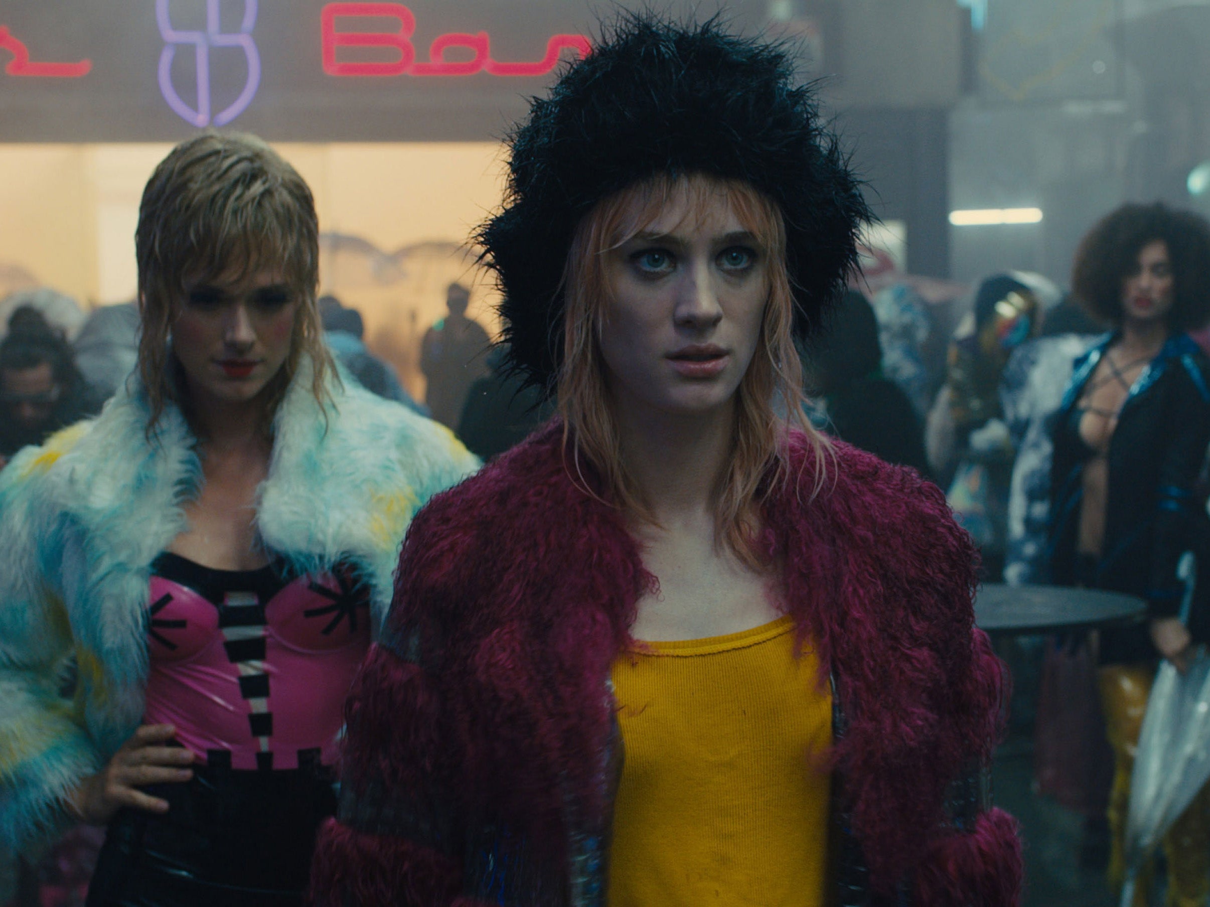 Mackenzie Davis (right) as Mariette: her overall style is big, bold and colourful, if a tad wilted