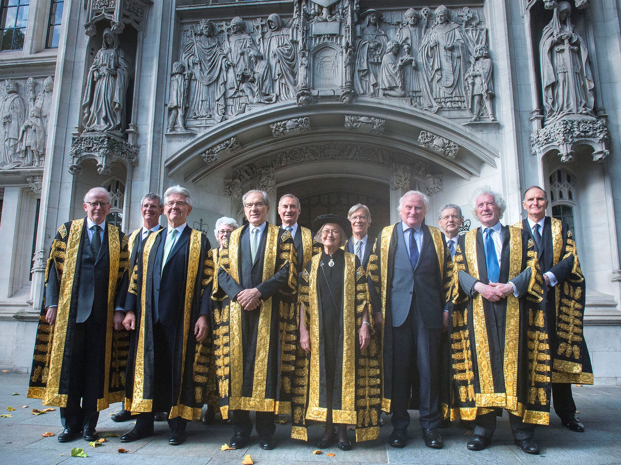 Lady Hale (centre) poses with other new justices after she was sworn in as the first female president of the UK's highest court, the Supreme Court