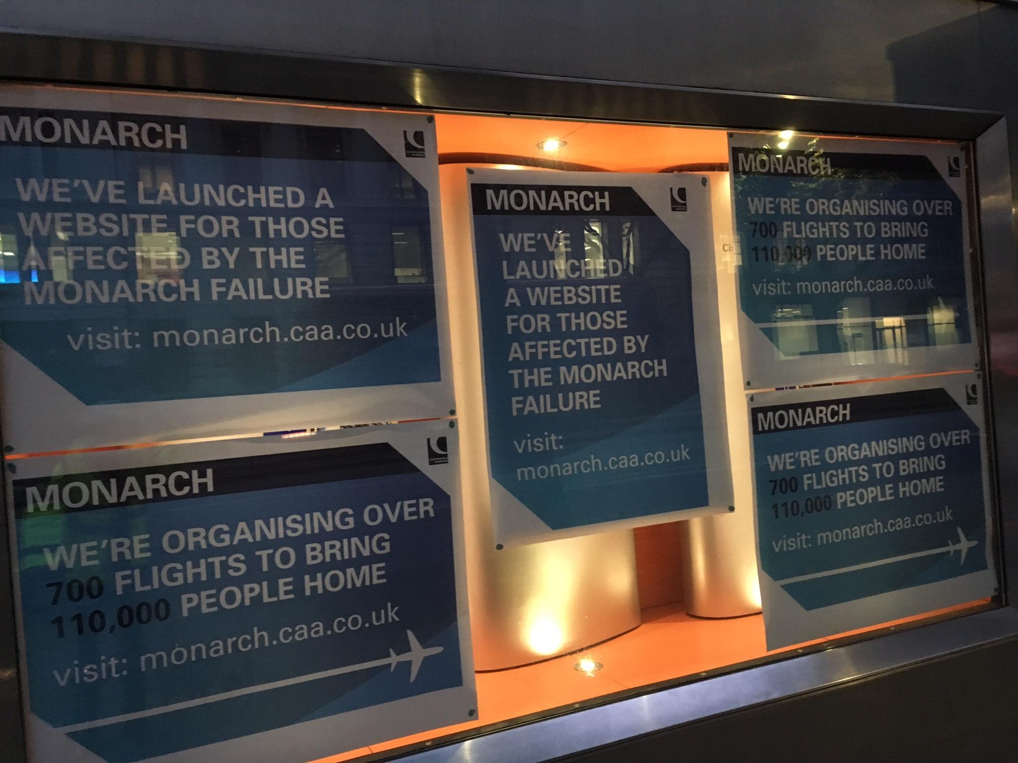 Plane talk: Posters about the Monarch collapse in the window of the CAA headquarters in central London