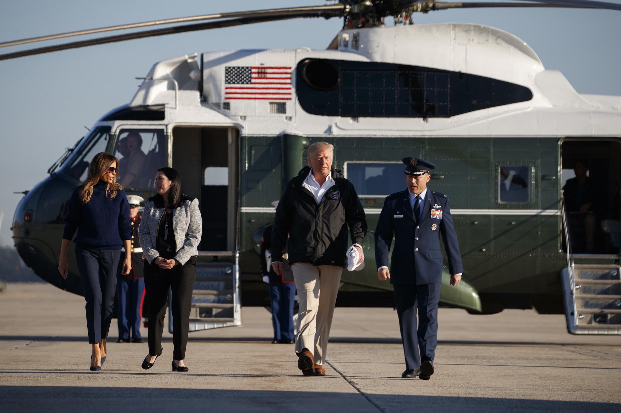 President Donald Trump and first lady Melania Trump board Air Force One for a trip to Puerto Rico