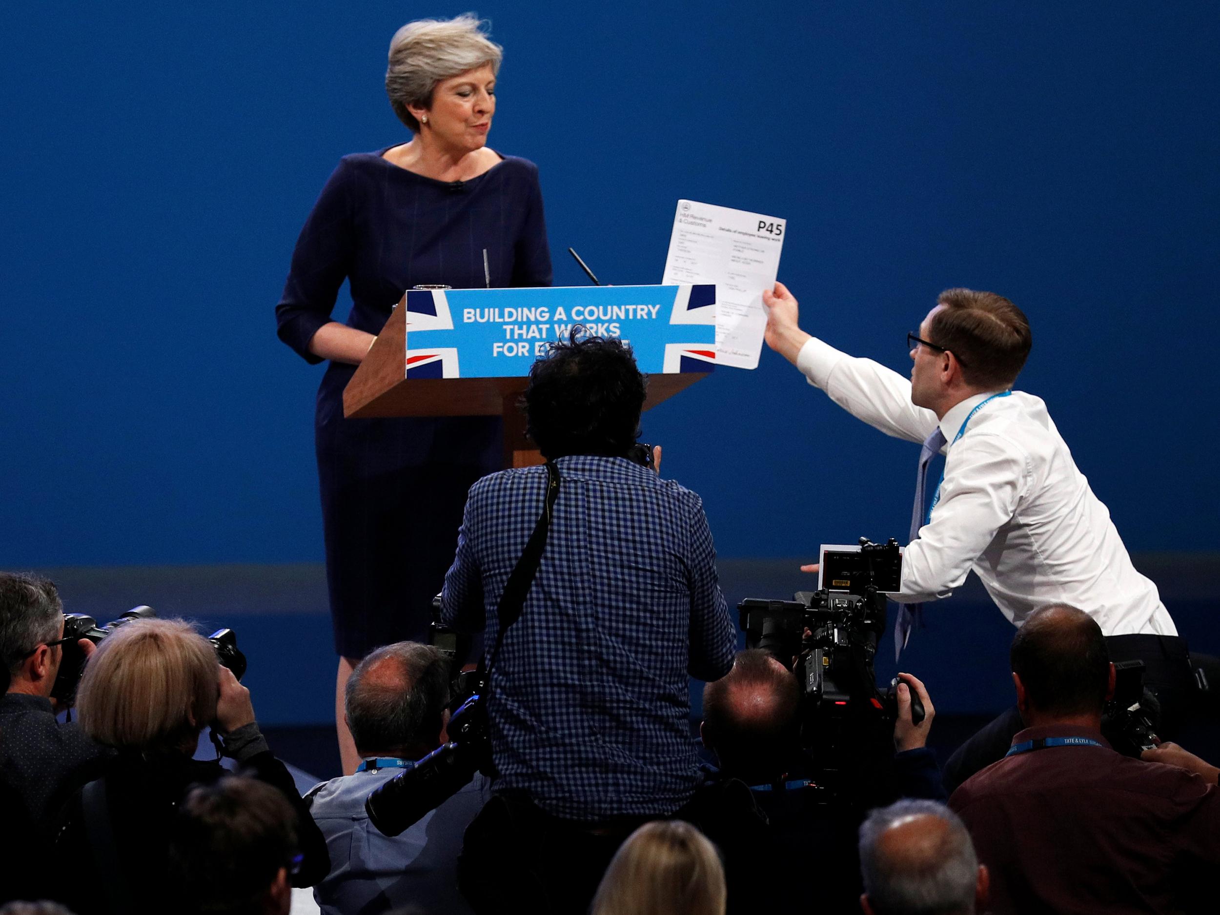 Mr Brodkin breaks ranks with the photographers he was posing amongst to approach Ms May