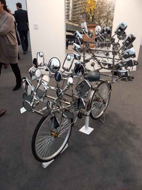 A gleaming bicycle with a thousand and one rear-view mirrors by Dinh Q. Le is worth a look