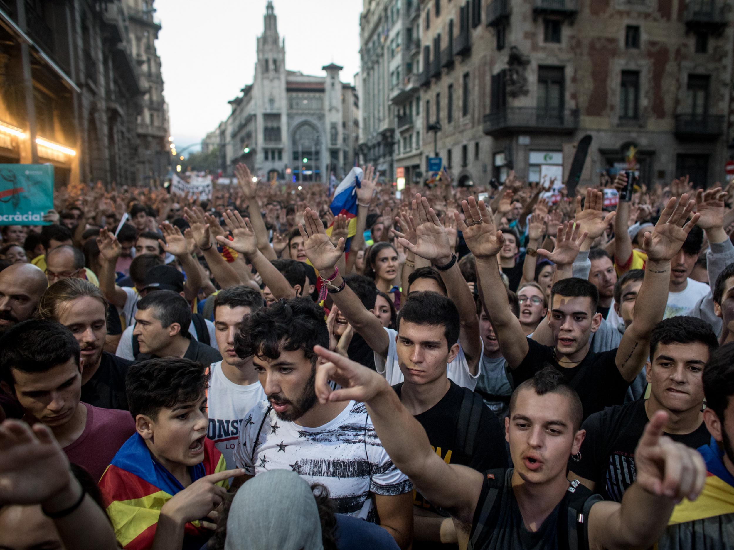 Thousands protested in Barcelona against the violence that marred Sunday’s referendum vote