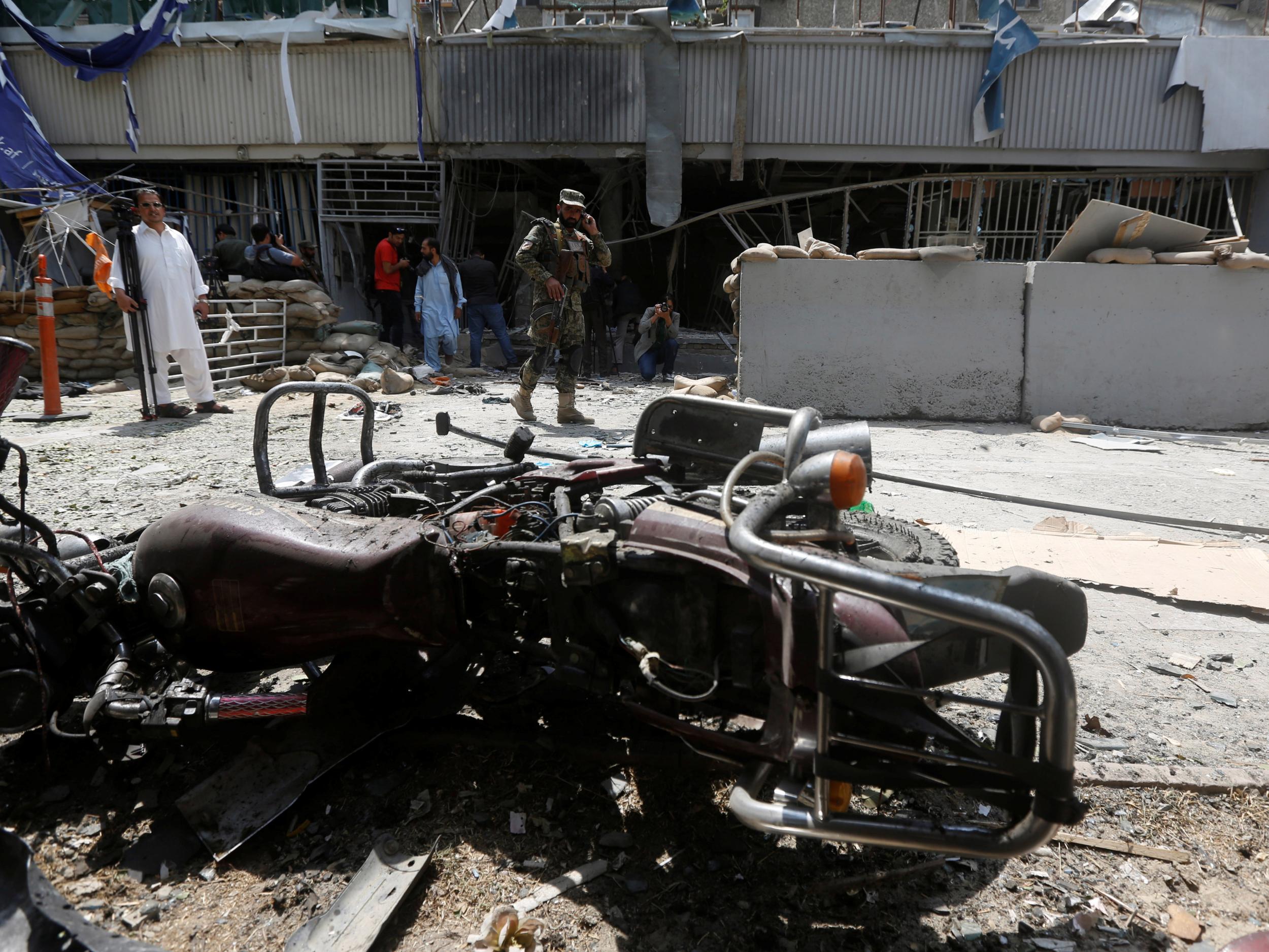 An Afghan security force stands guard at the site of a suicide bomb attack in Kabul, Afghanistan August 29, 2017