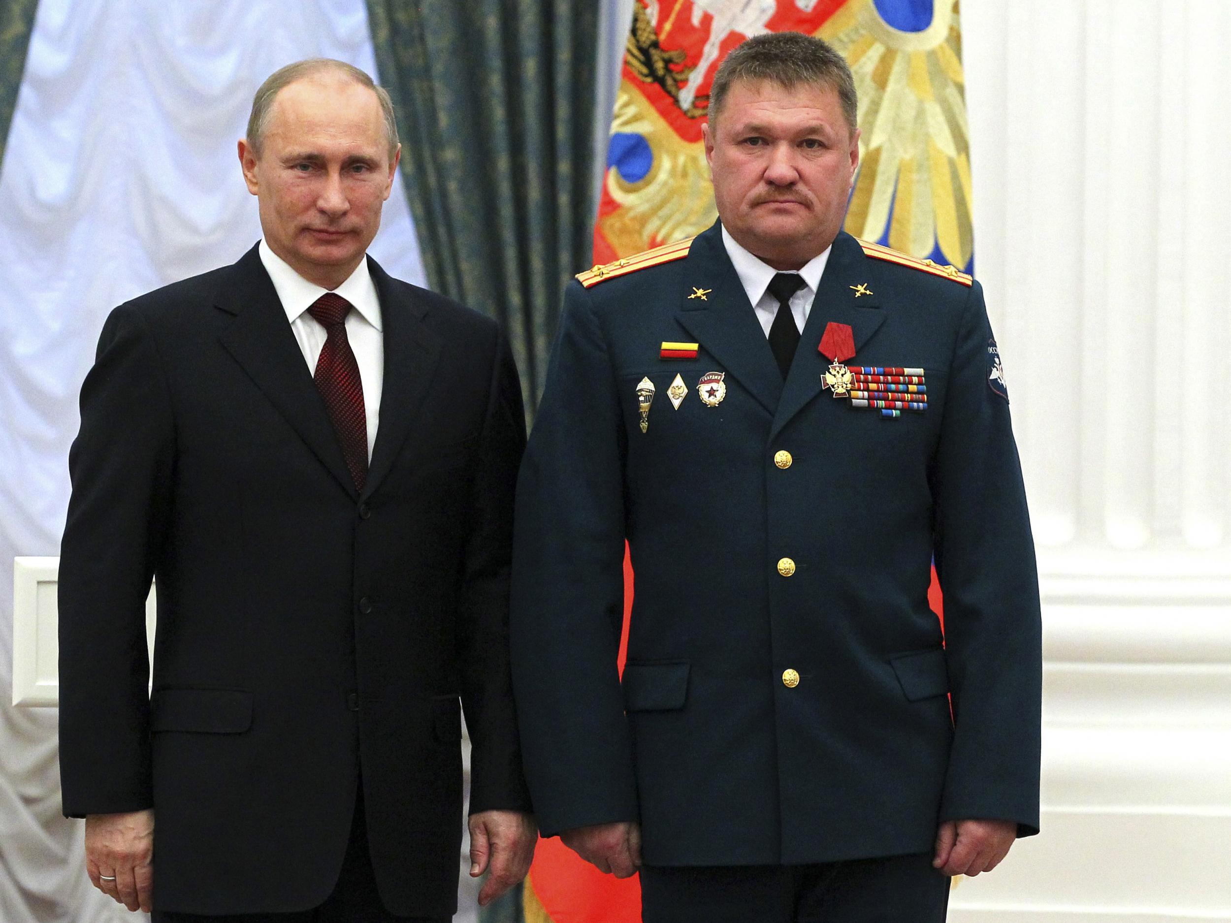 Lieutenant General Valery Asapov (right, with President Putin) was killed in Deir Ezzor last month as he assisted Syrian commanders in their recapture of the city