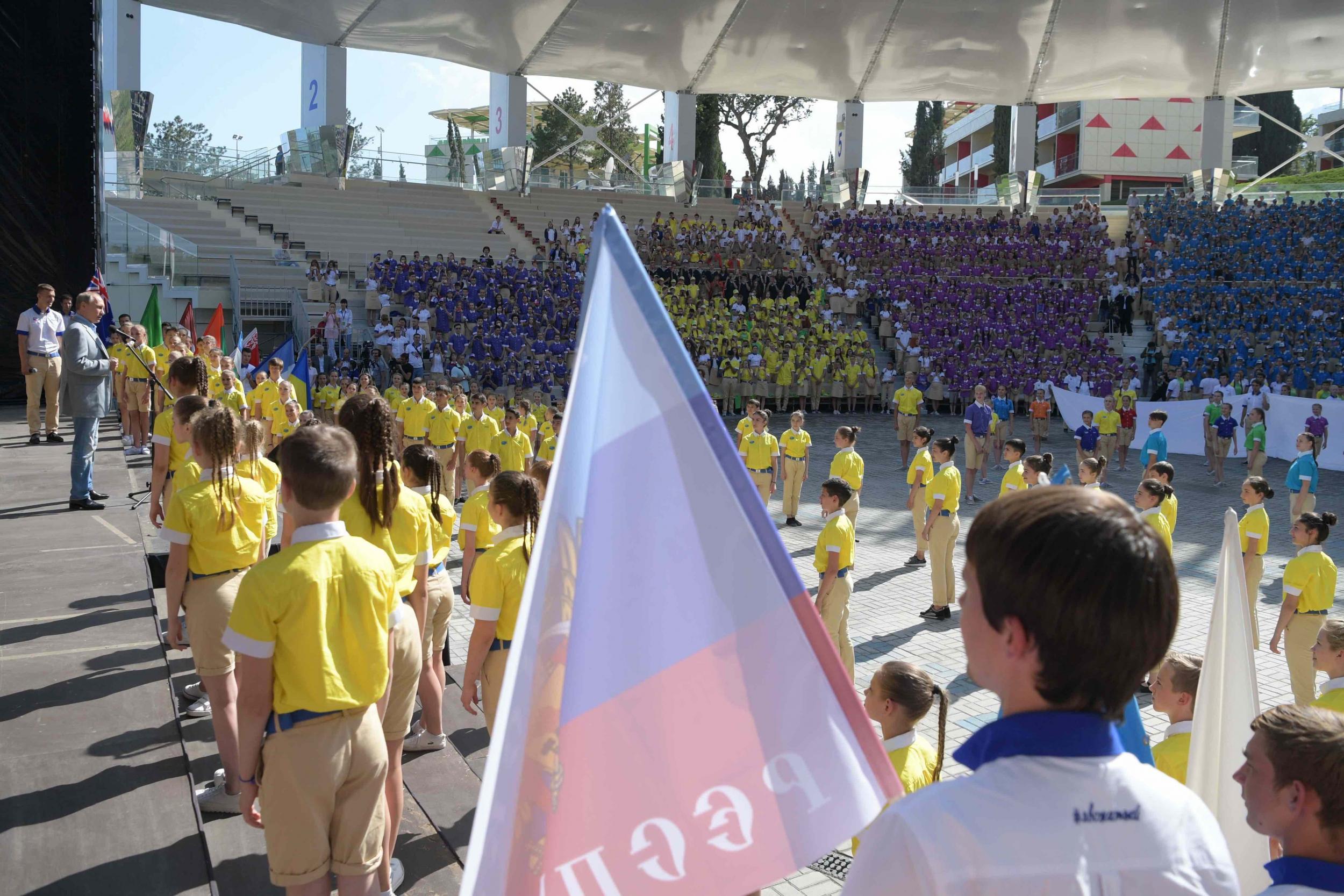 Vladimir Putin addresses children at the Artek centre in June