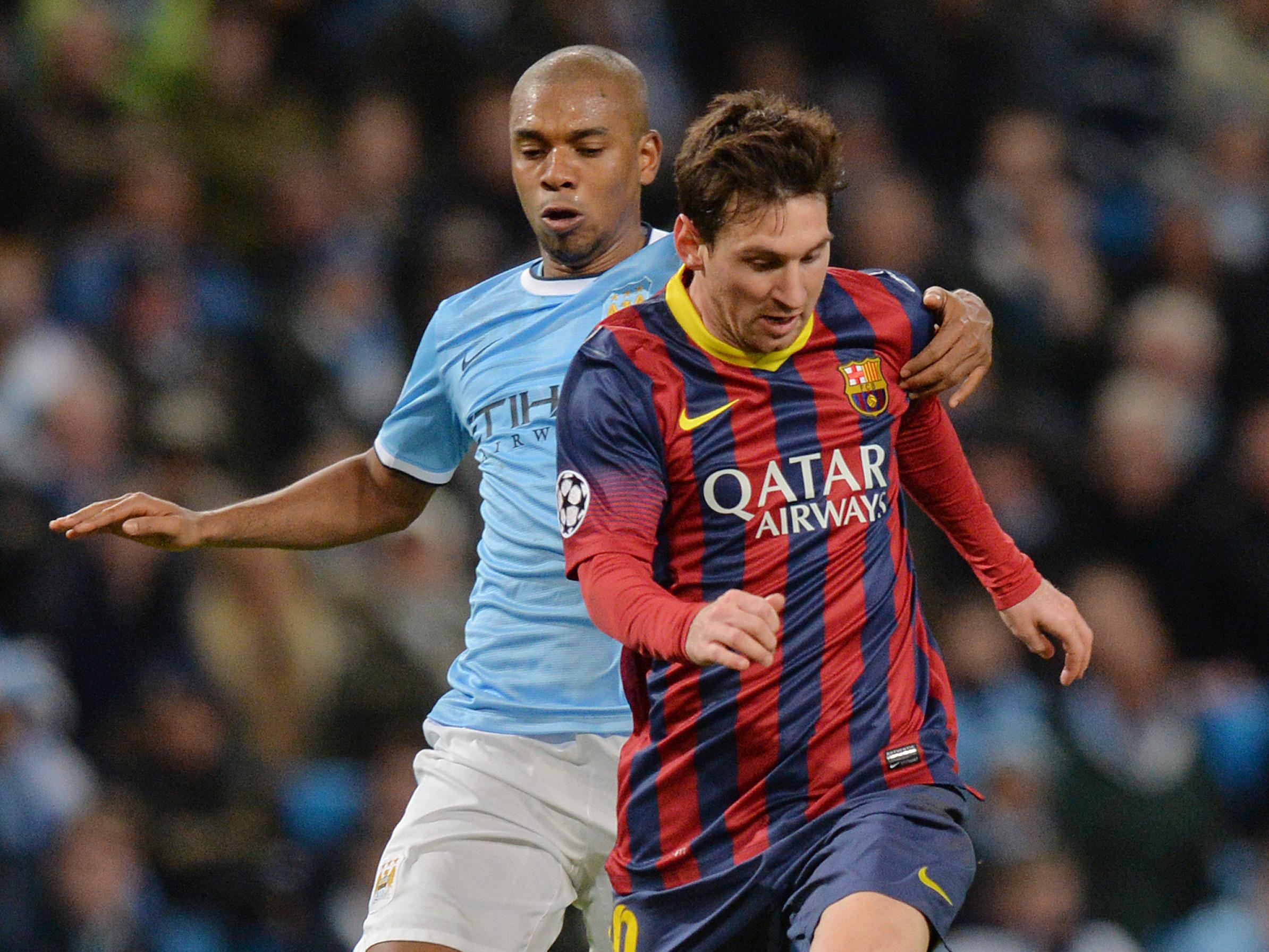 Lionel Messi and Fernandinho go head to head at the Etihad in 2014