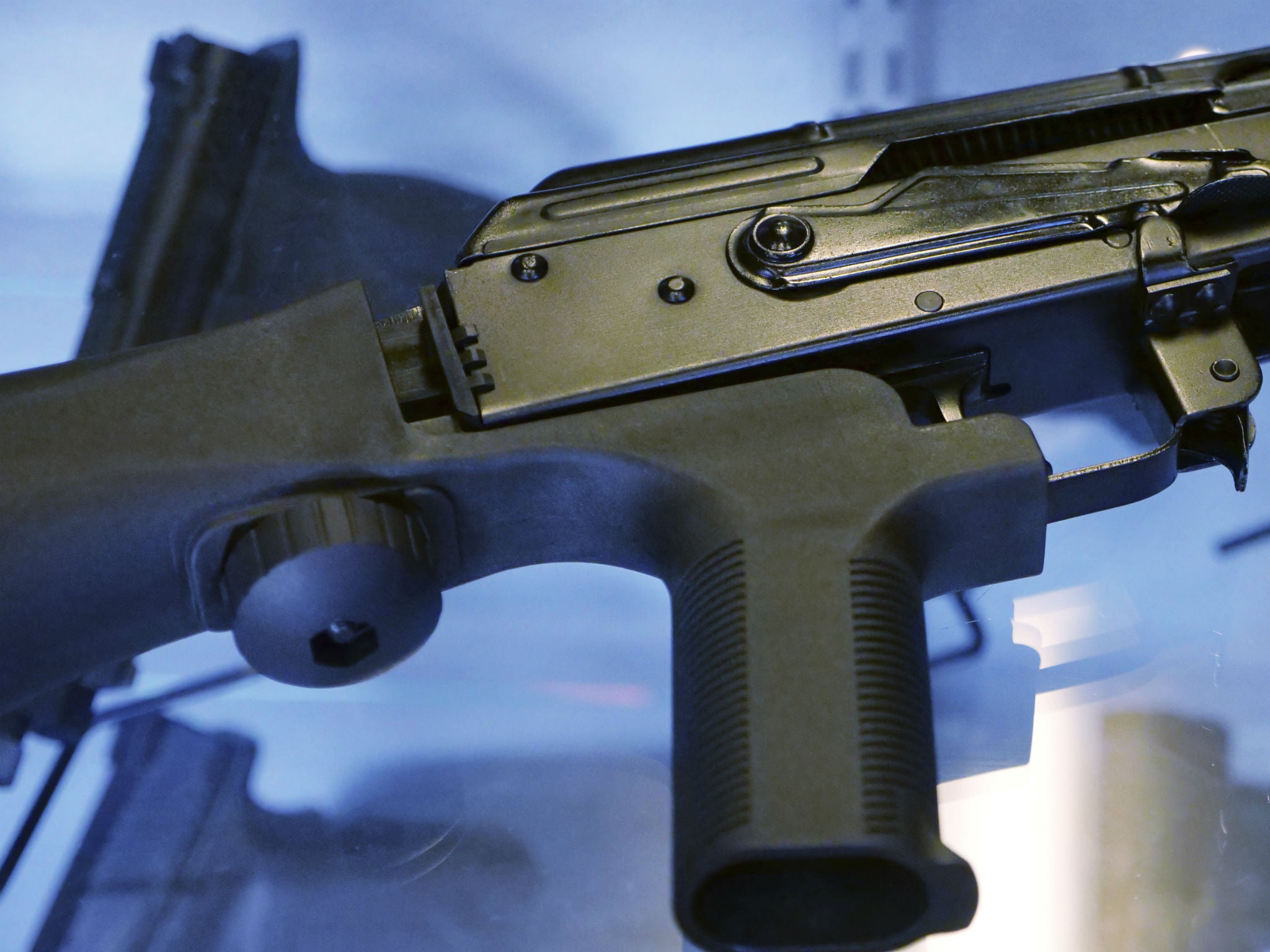 A bump stock attached to a semi-automatic rifle at a store and shooting range in South Jordan, Utah on October 5, 2017