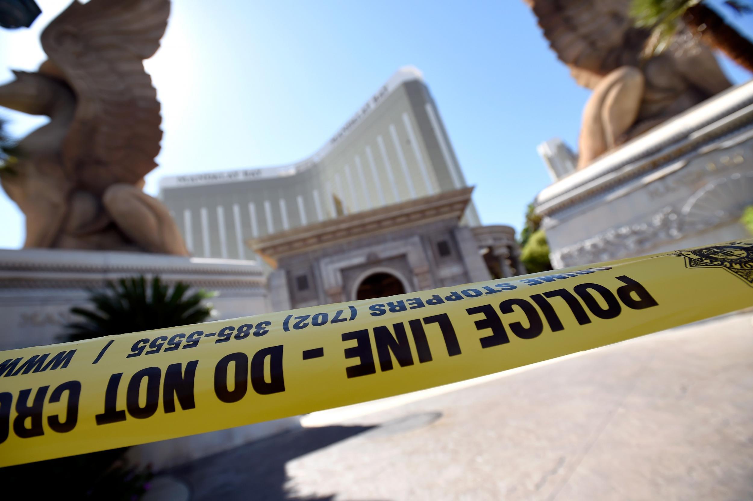 Police tape blocks an entrance at the Mandalay Bay Resort & Caisno